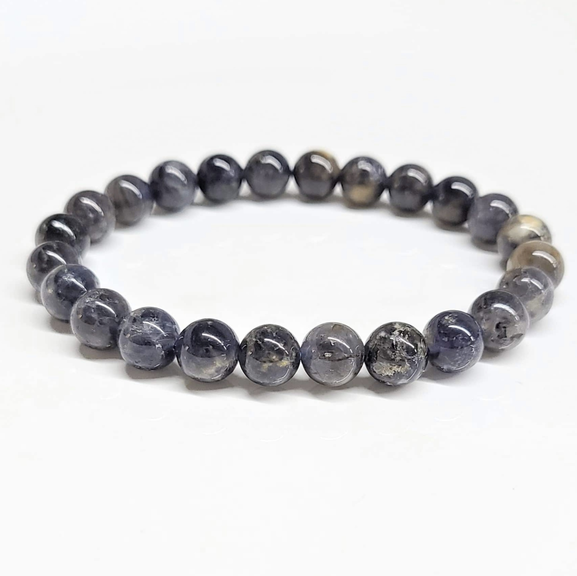 Iolite stackable round bead bracelet in indigo and violet hues for visionary guidance and spiritual balance