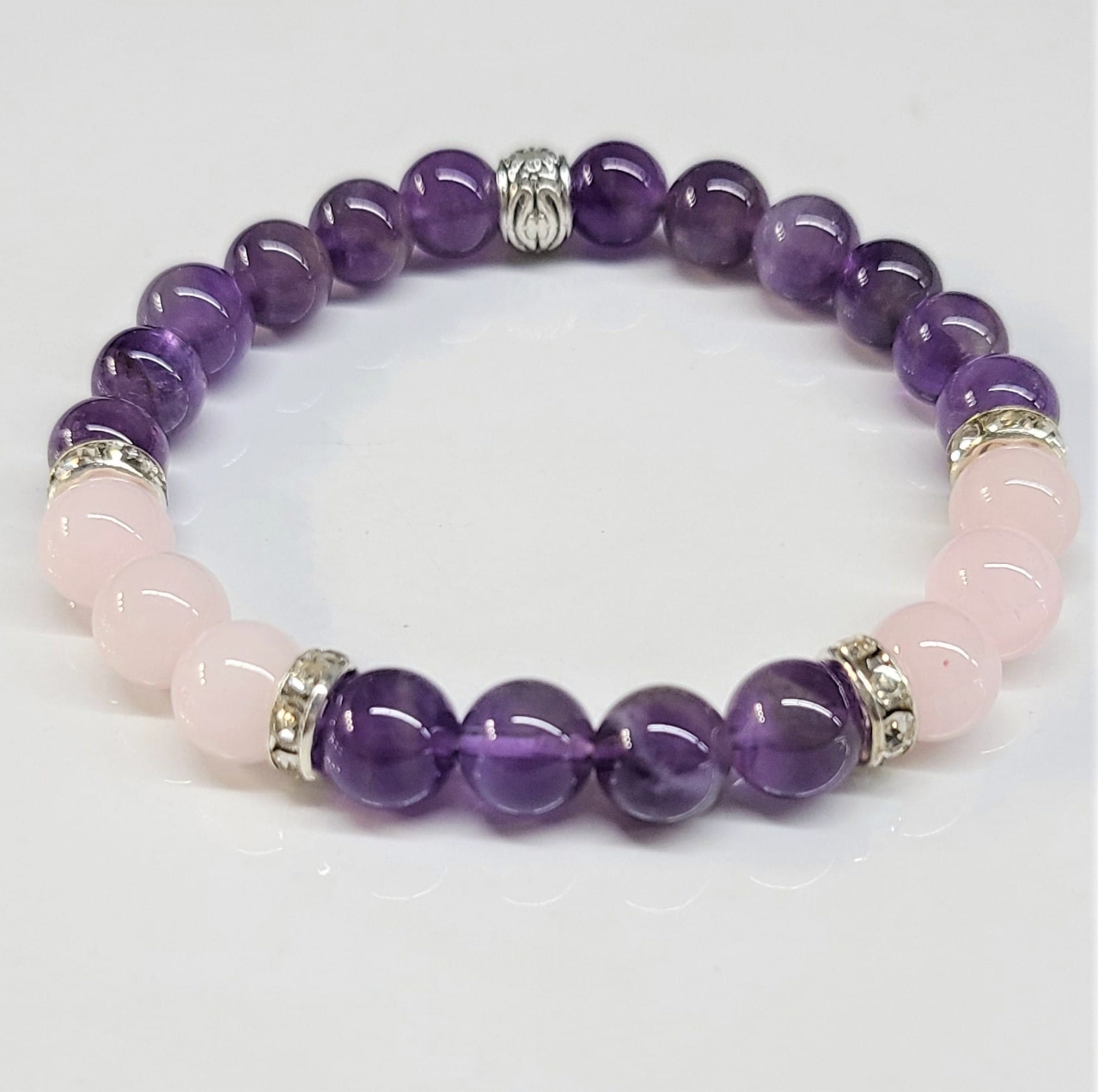 Amethyst and rose quartz round bead stackable bracelet with silver spacers for spiritual harmony and emotional balance