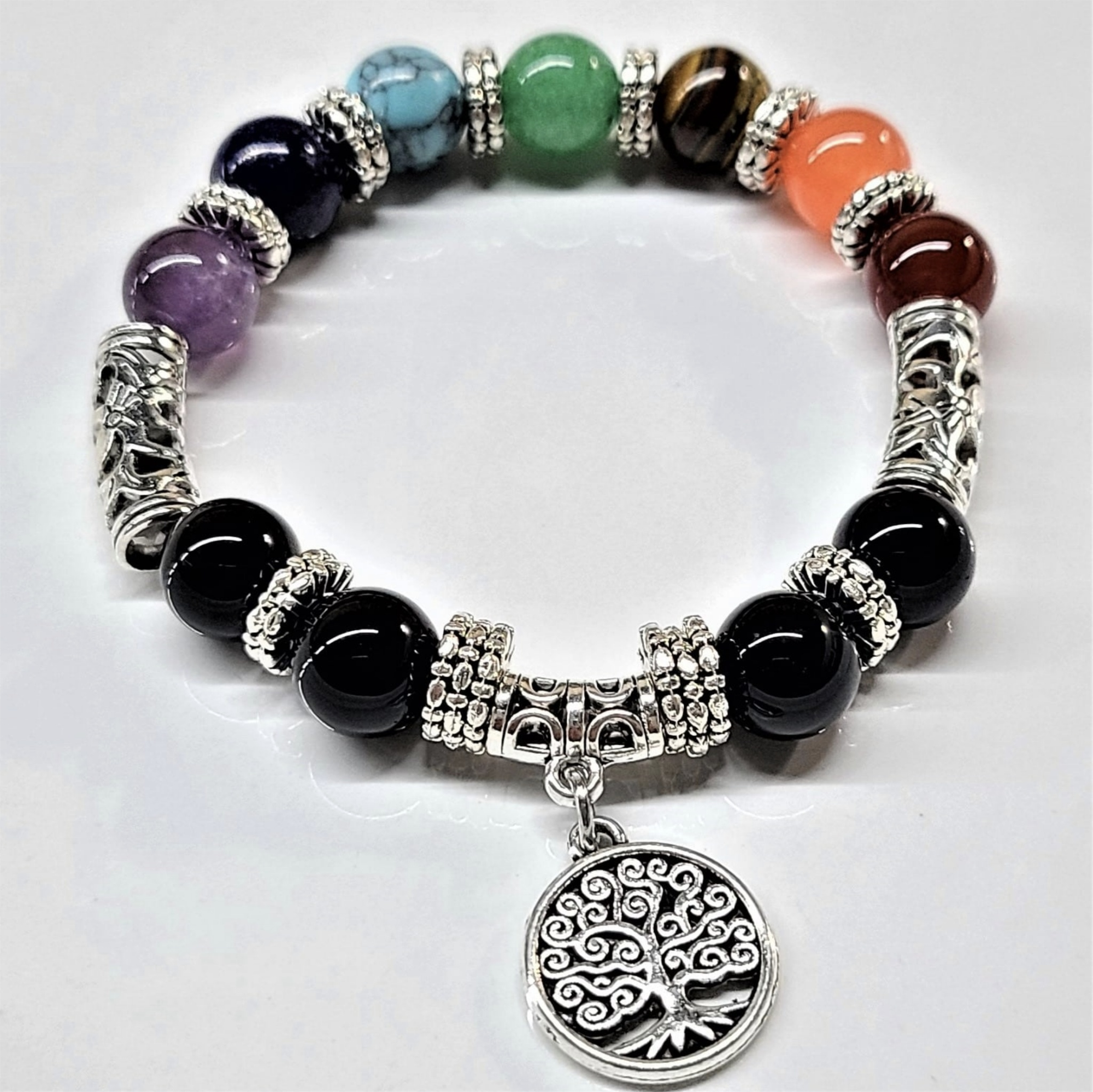 10mm gemstone chakra bracelet with multicolored round beads and silver tree of life charm