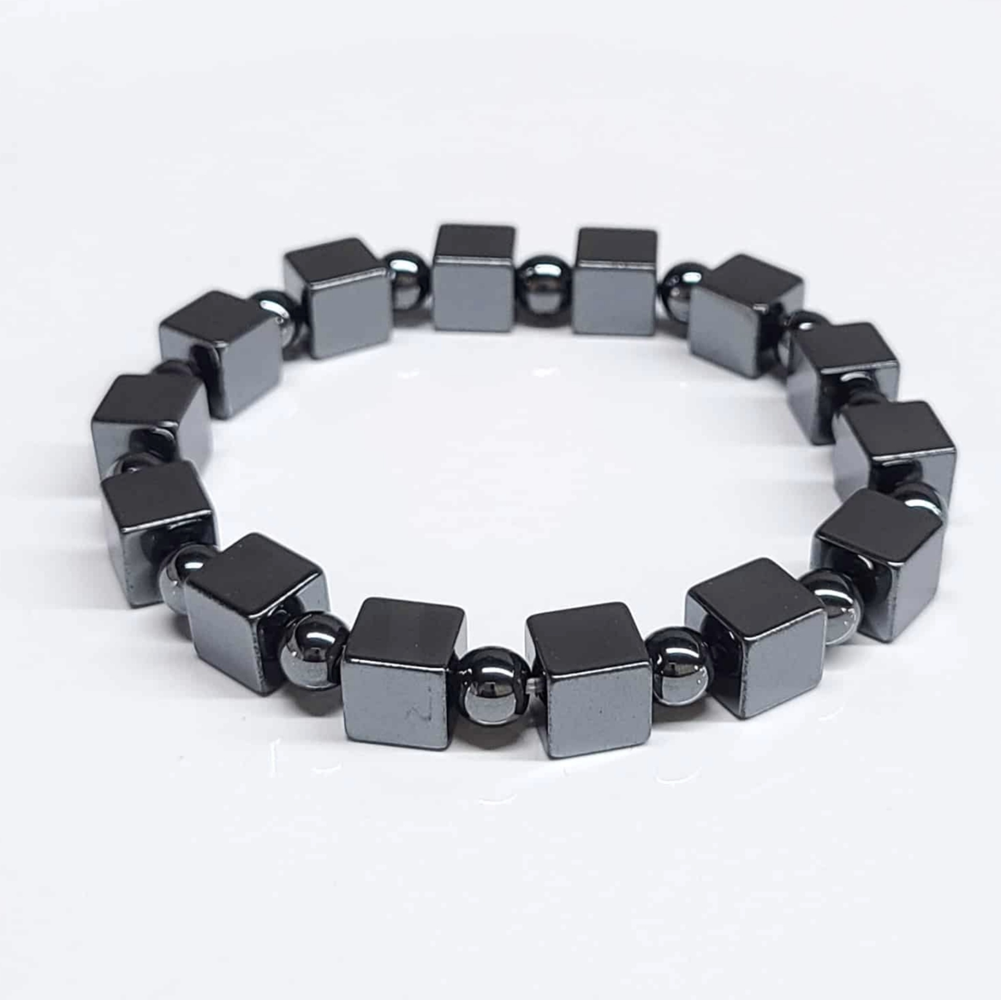 Hematite cube stackable bracelet with metallic sheen for grounding and protection.