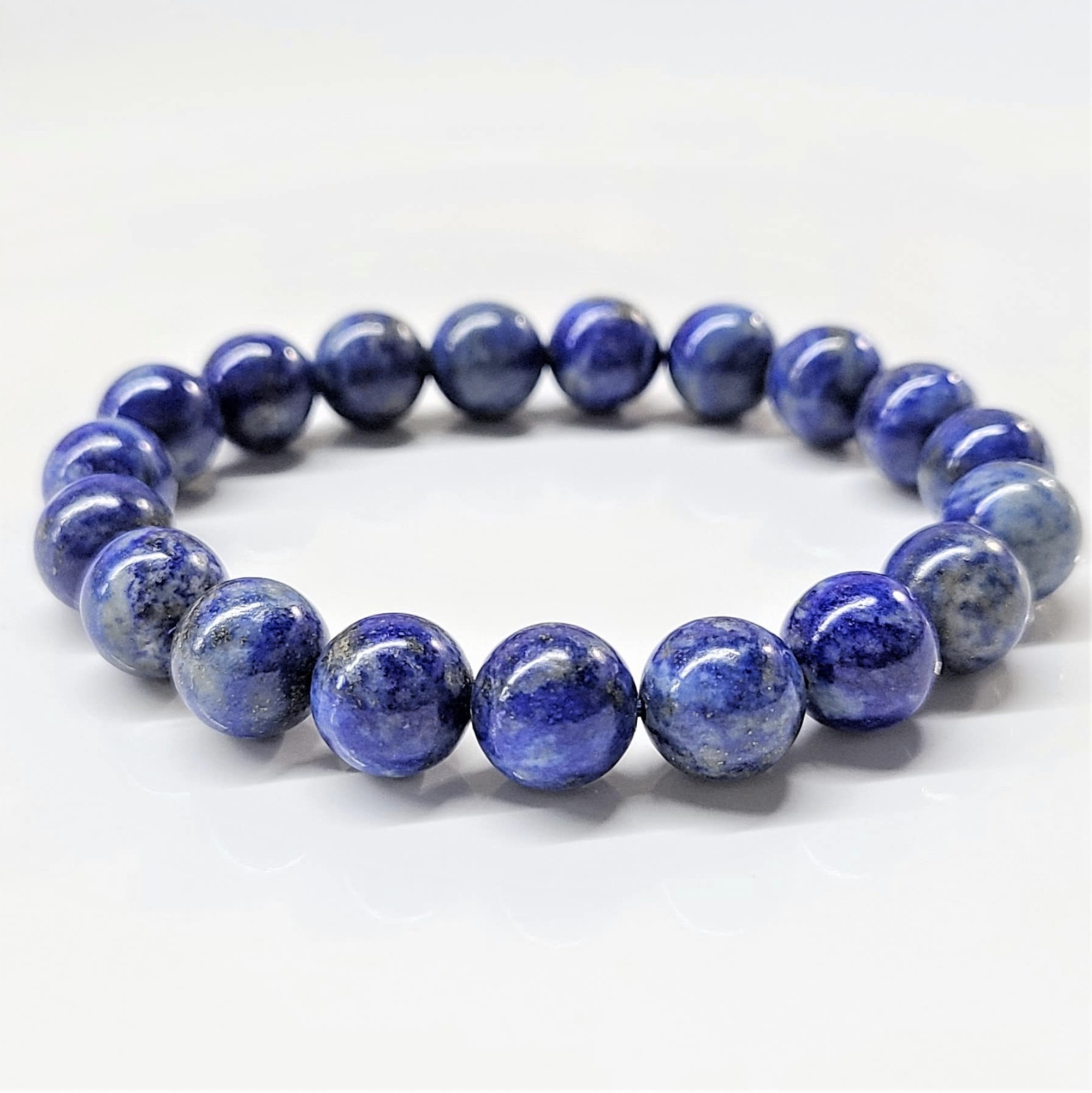 Lapis Lazuli round bead stackable bracelet with vibrant blue and gold flecked stones