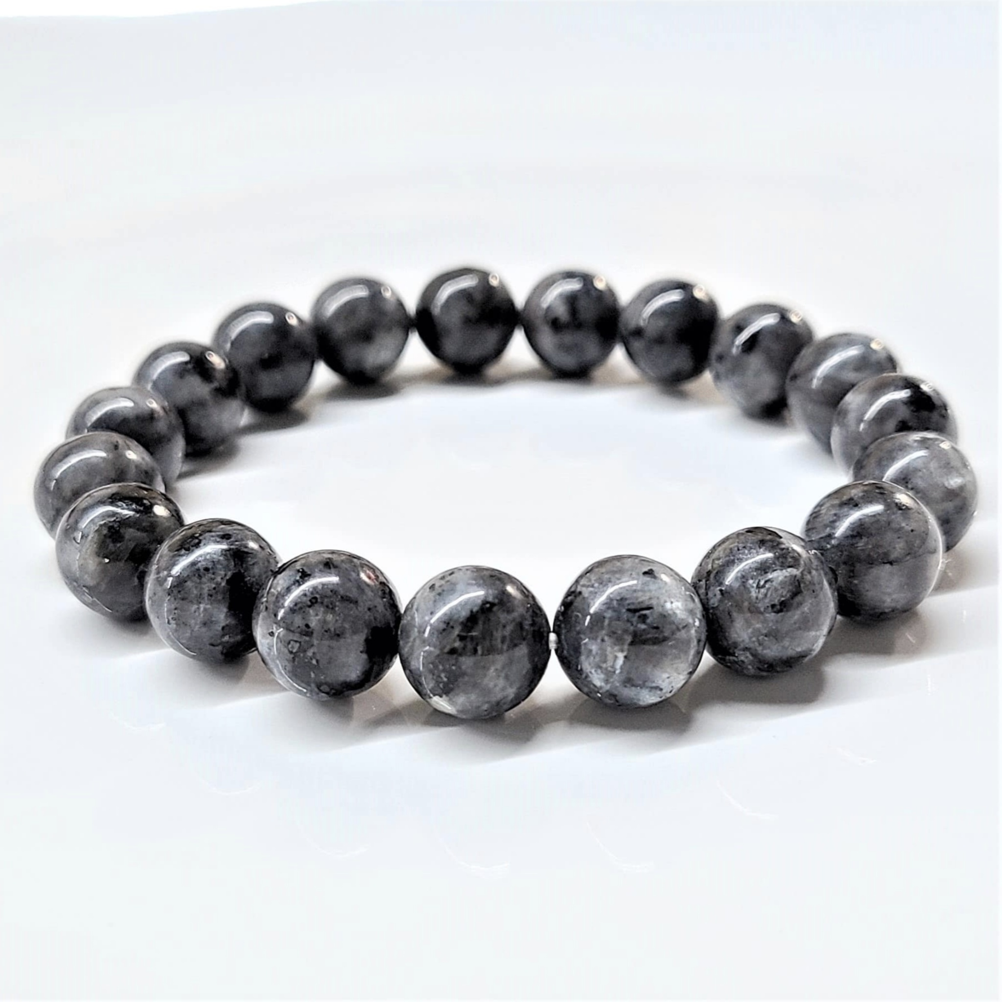 Larvikite round bead stackable bracelet with polished dark gray stones and subtle blue flashes