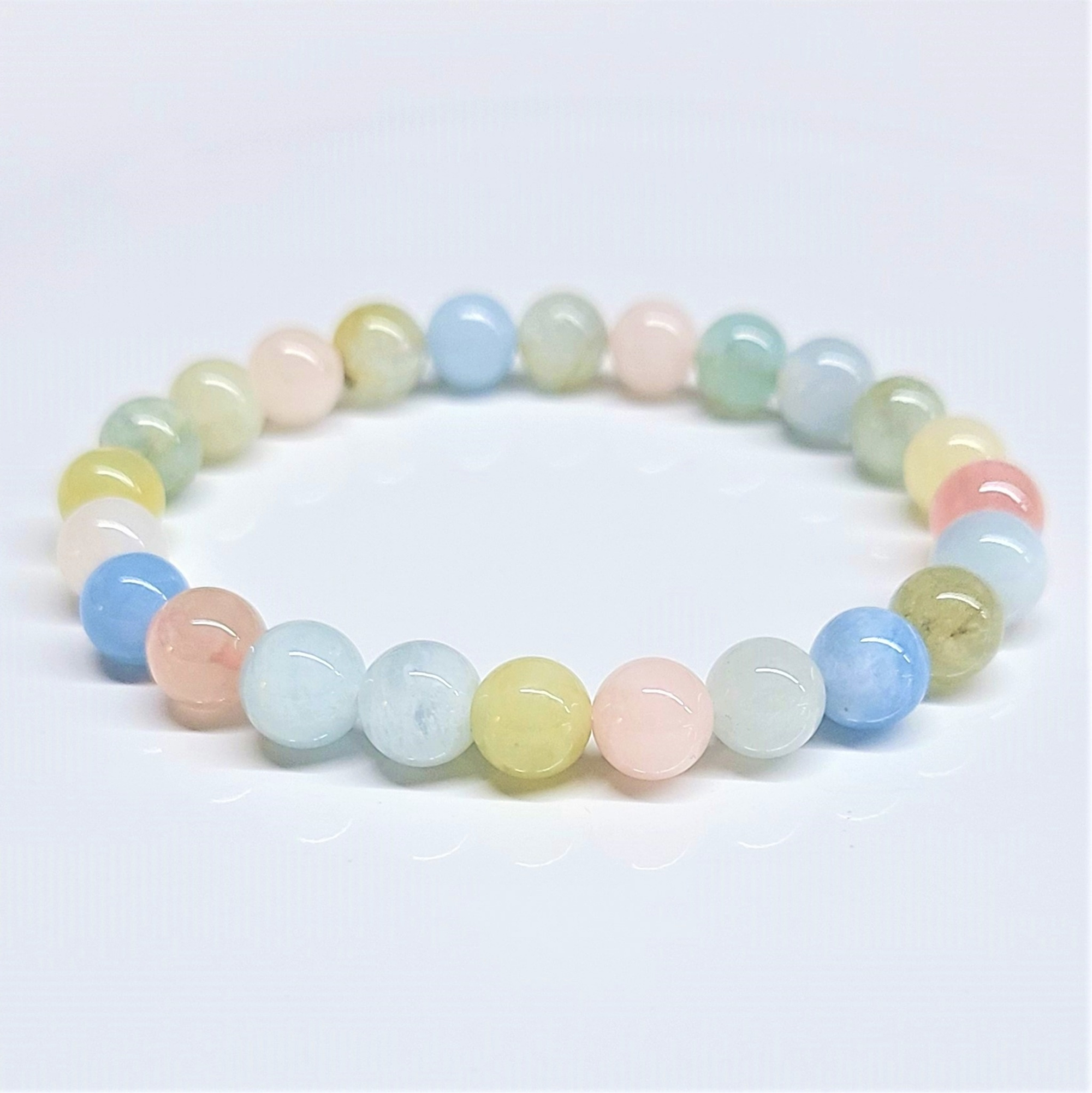 Morganite stackable bracelet with 8mm pastel pink, blue, yellow, and green round beads