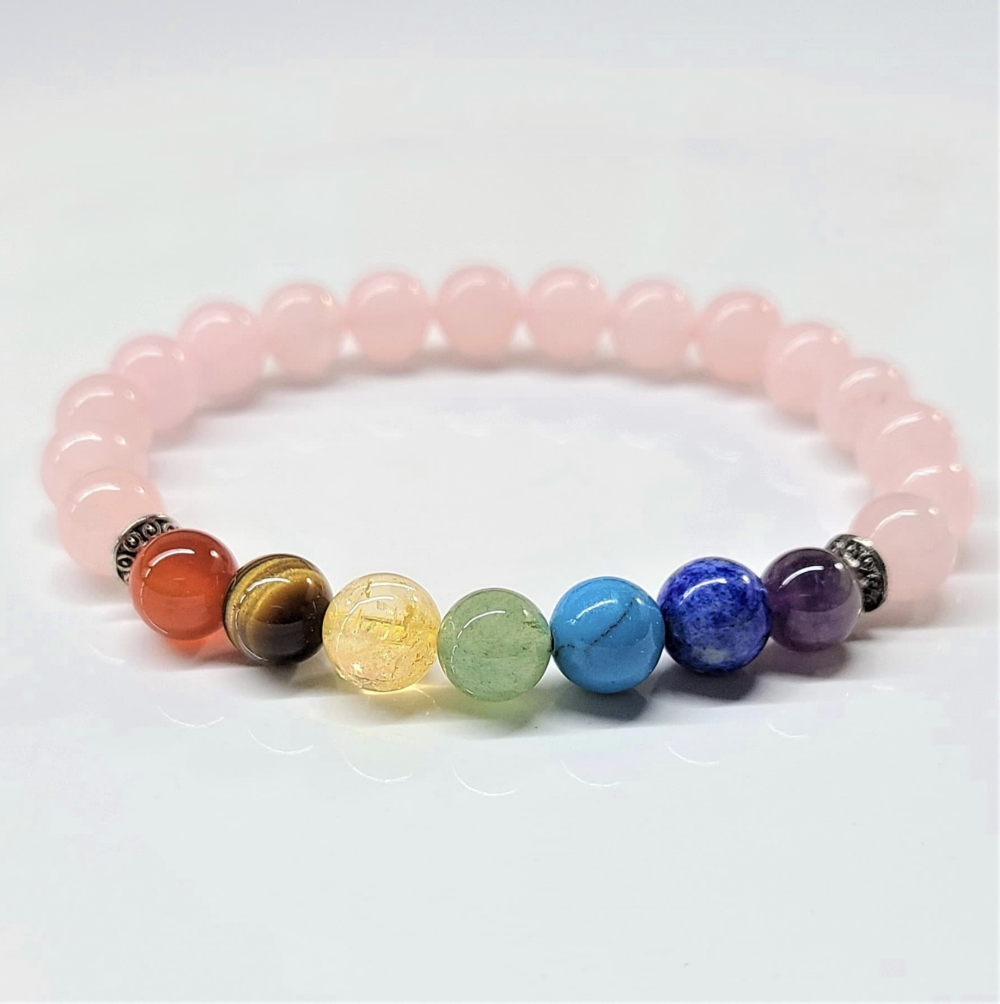 Rose Quartz Chakra Bracelet with 8mm round beads featuring seven chakra stones for love and energy balance
