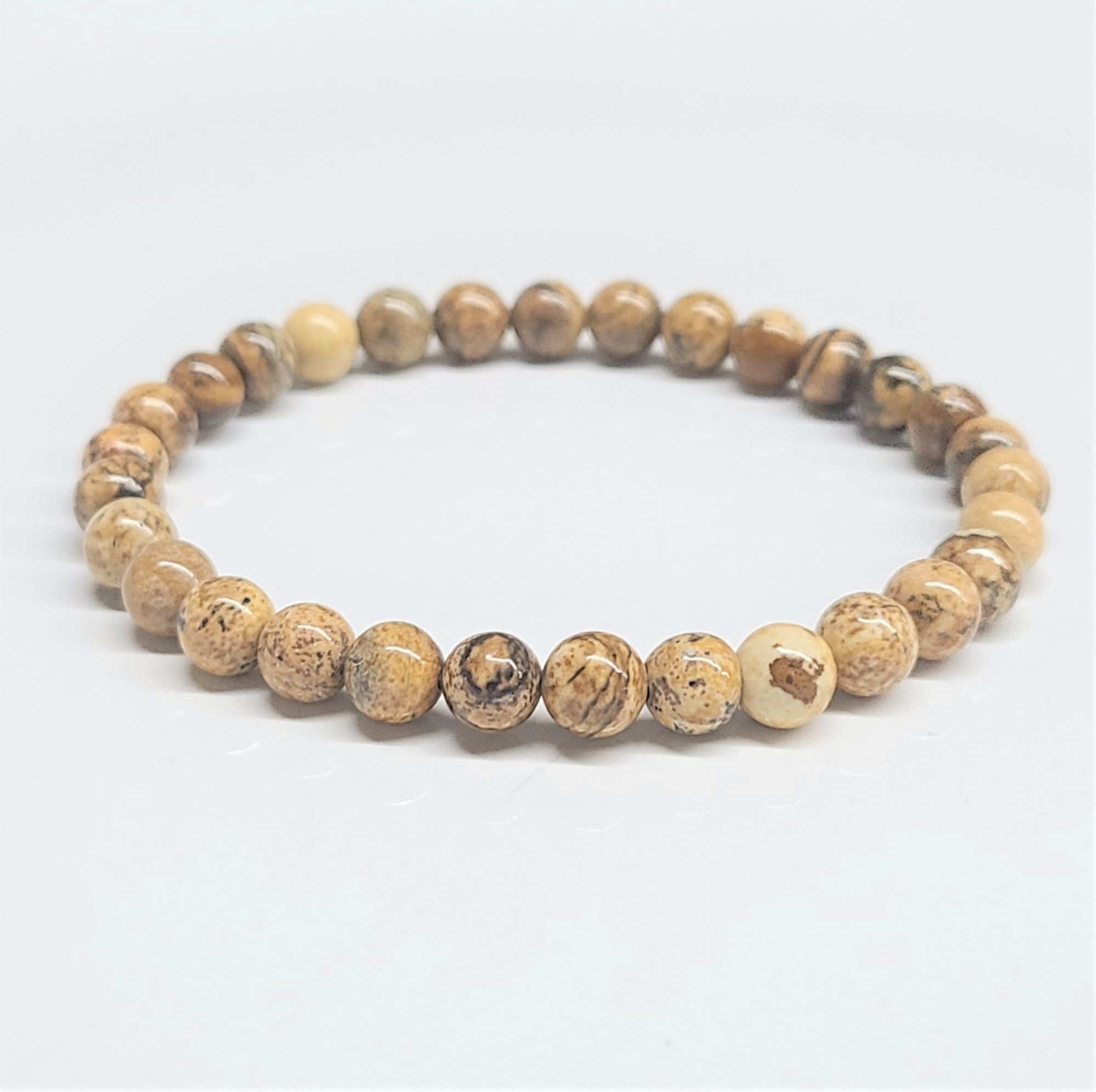 Picture Jasper stackable bracelet made of round natural earthy-toned beads with unique patterns for grounding and creativity