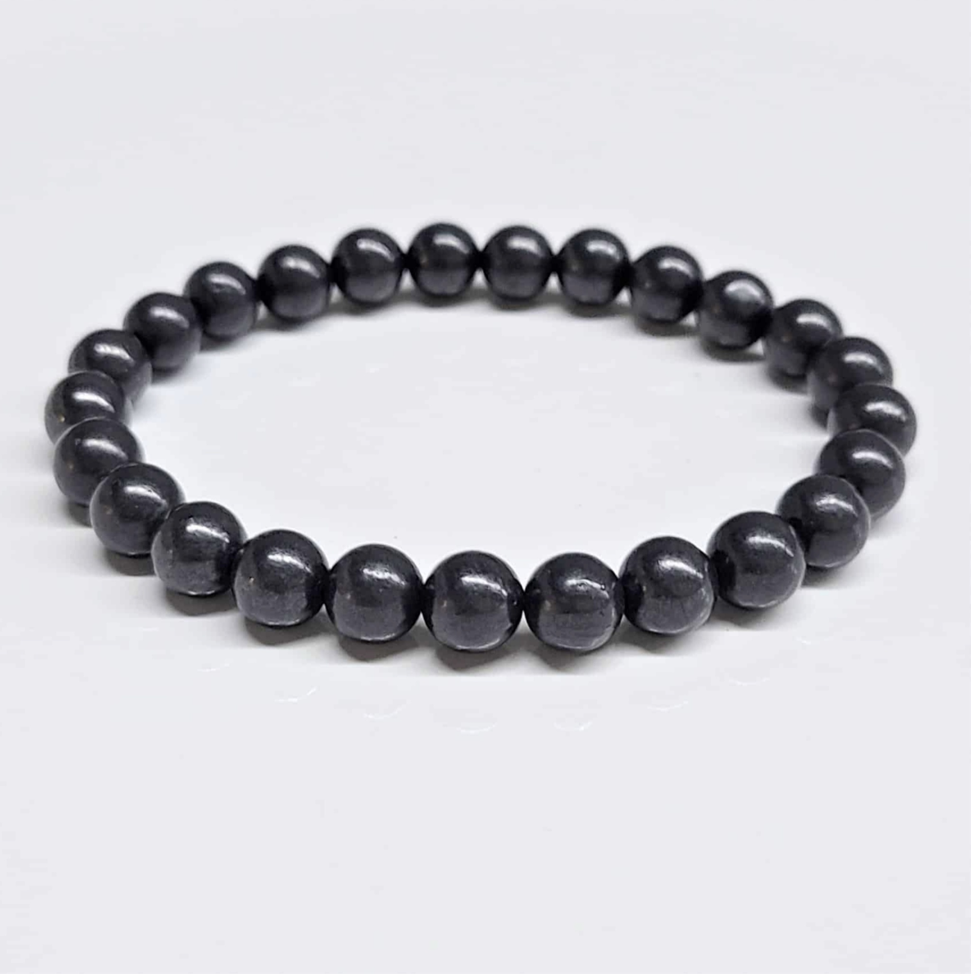Shungite round bead stackable bracelet for grounding, protection, and energy balancing.