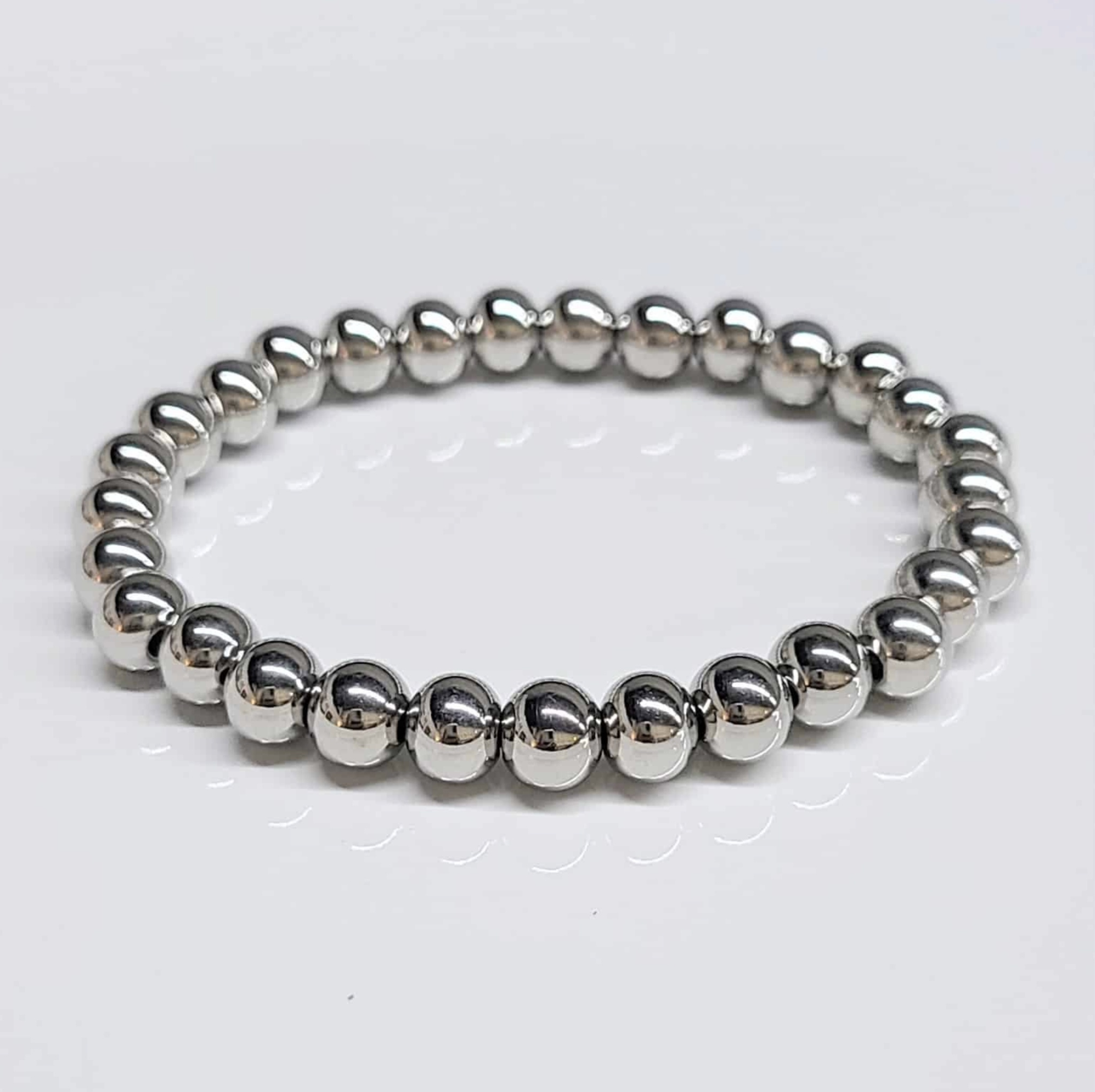 Stainless steel round bead bracelet "Pop" with a polished, reflective finish and modern elegant design.