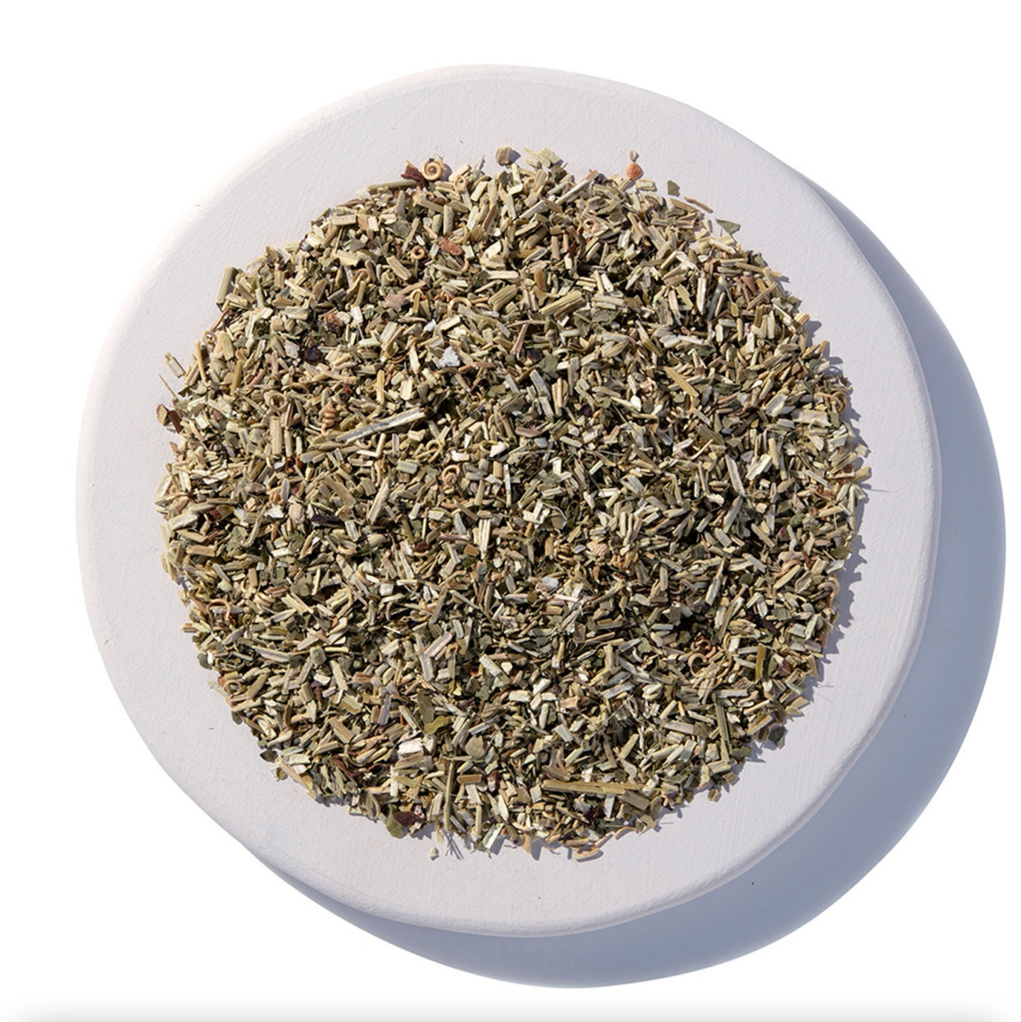 Dried Passion Flower herb on white plate for metaphysical uses, 1oz.