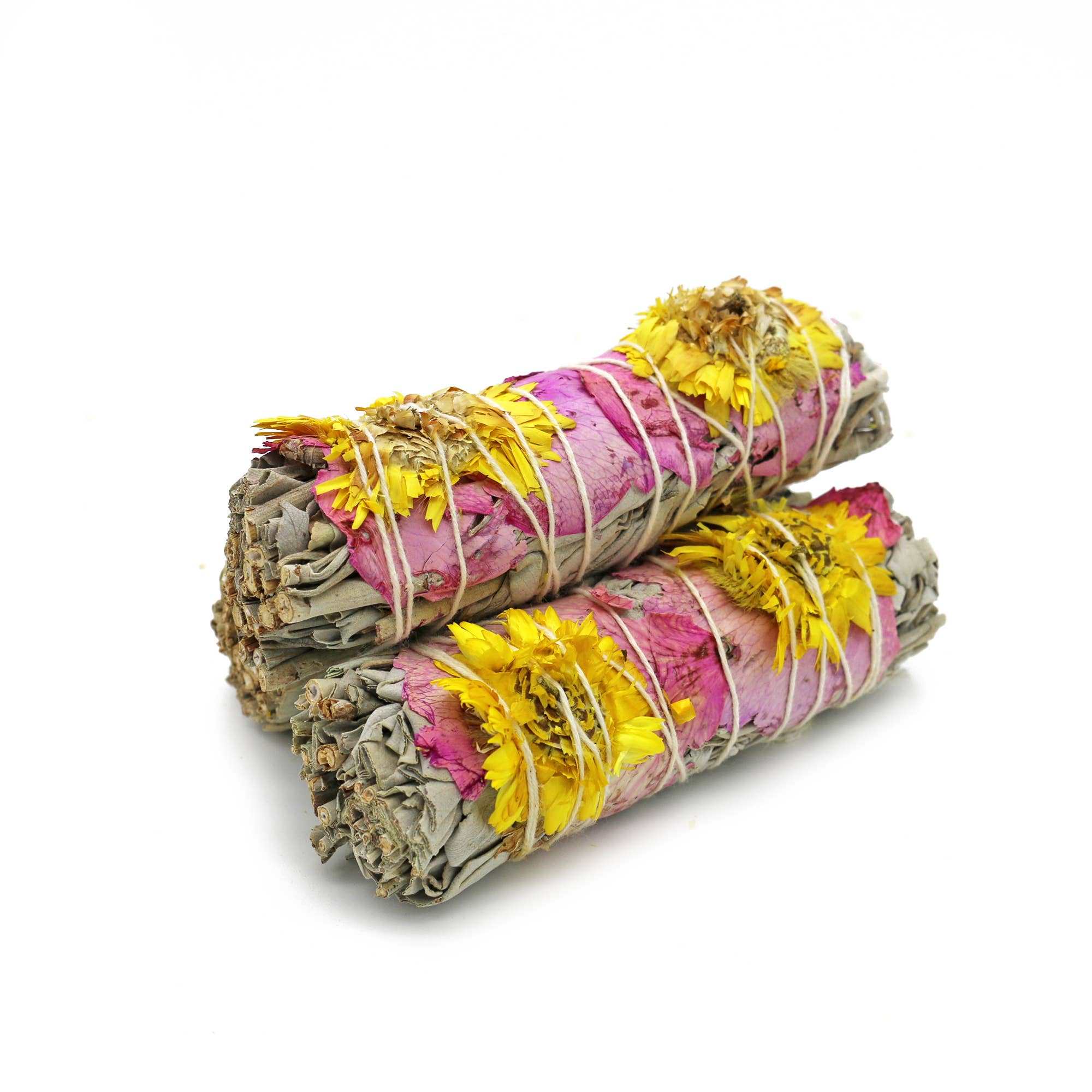 Two 4-inch Amor floral white sage smudge sticks wrapped with pink rose petals and yellow sunflowers on a white background