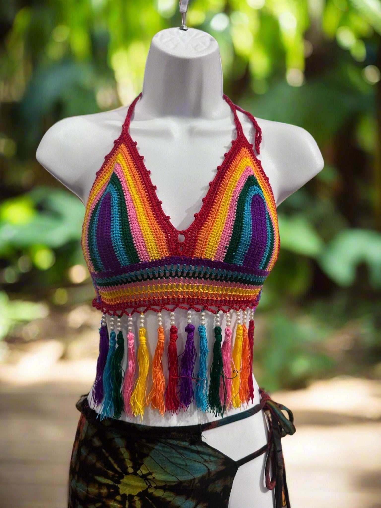 Rainbow Pride Bikini Top crochet with vibrant rainbow colors, pearl accents, and colorful fringe tassels.