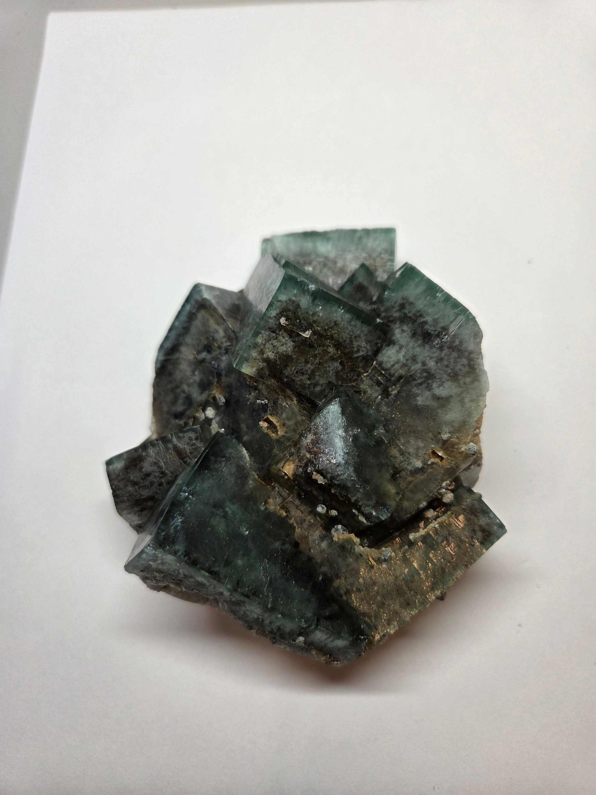 Green Fluorite Specimen crystal with vibrant green hues on white background for clarity and spiritual growth
