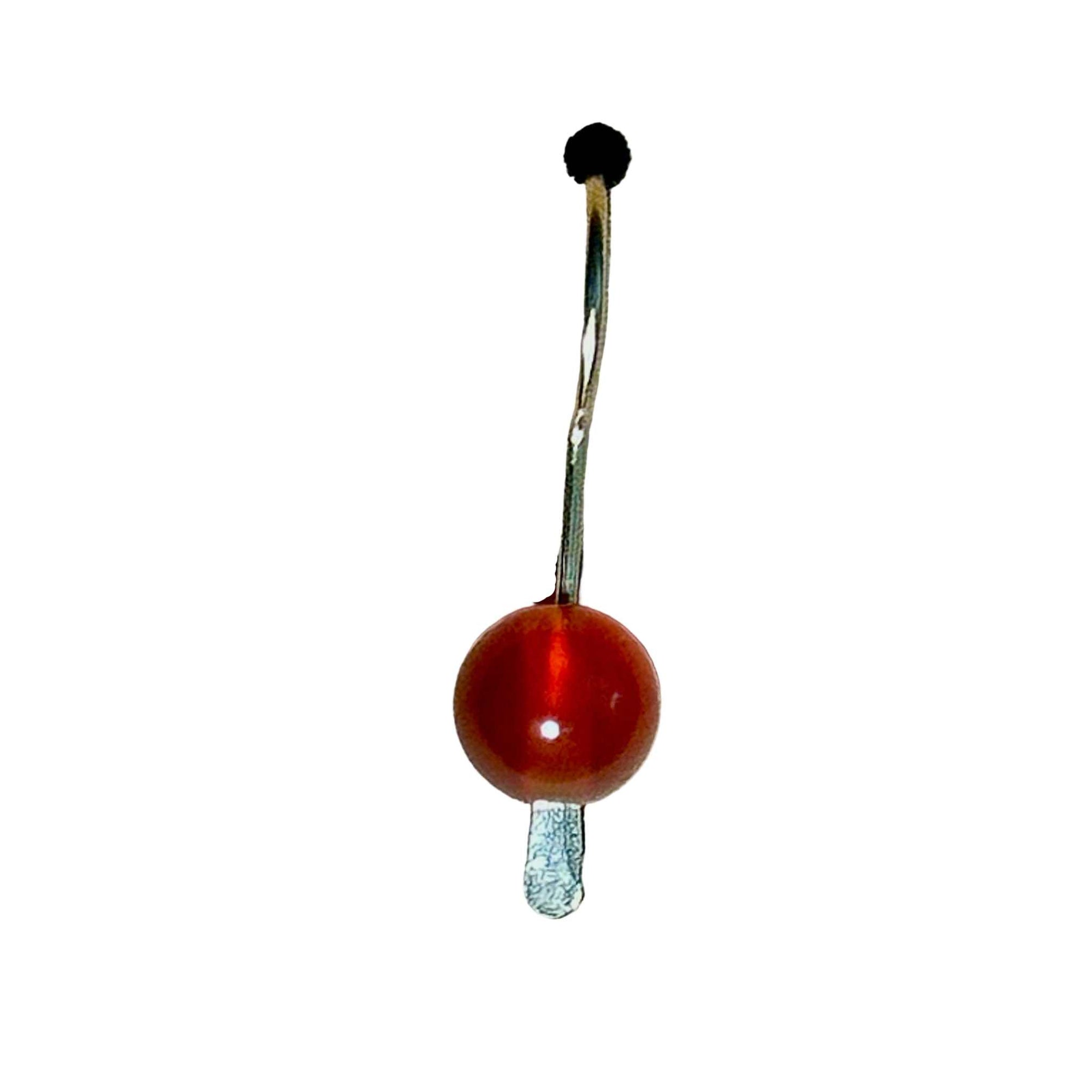 Earring with red Carnelian stones on a background