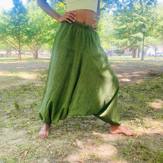 Handmade cotton unisex harem yoga pants with elastic waist in outdoor setting.