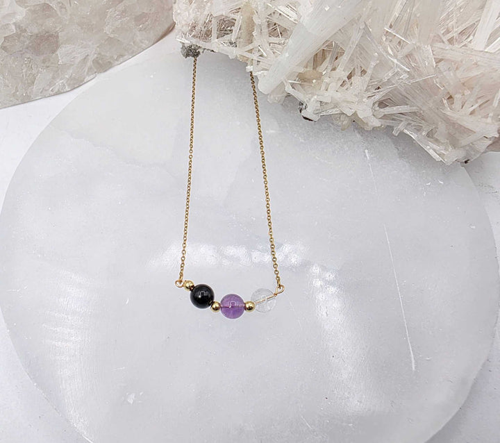 SACRED SPACE -Clear Quartz, Amethyst, Black Onyx Jewelry Set