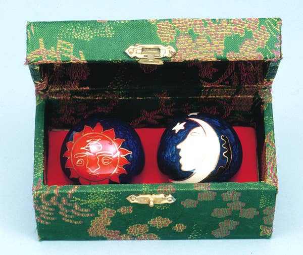 Sun &amp; Moon Therapy Balls in decorative box for sensory relaxation and stress relief.