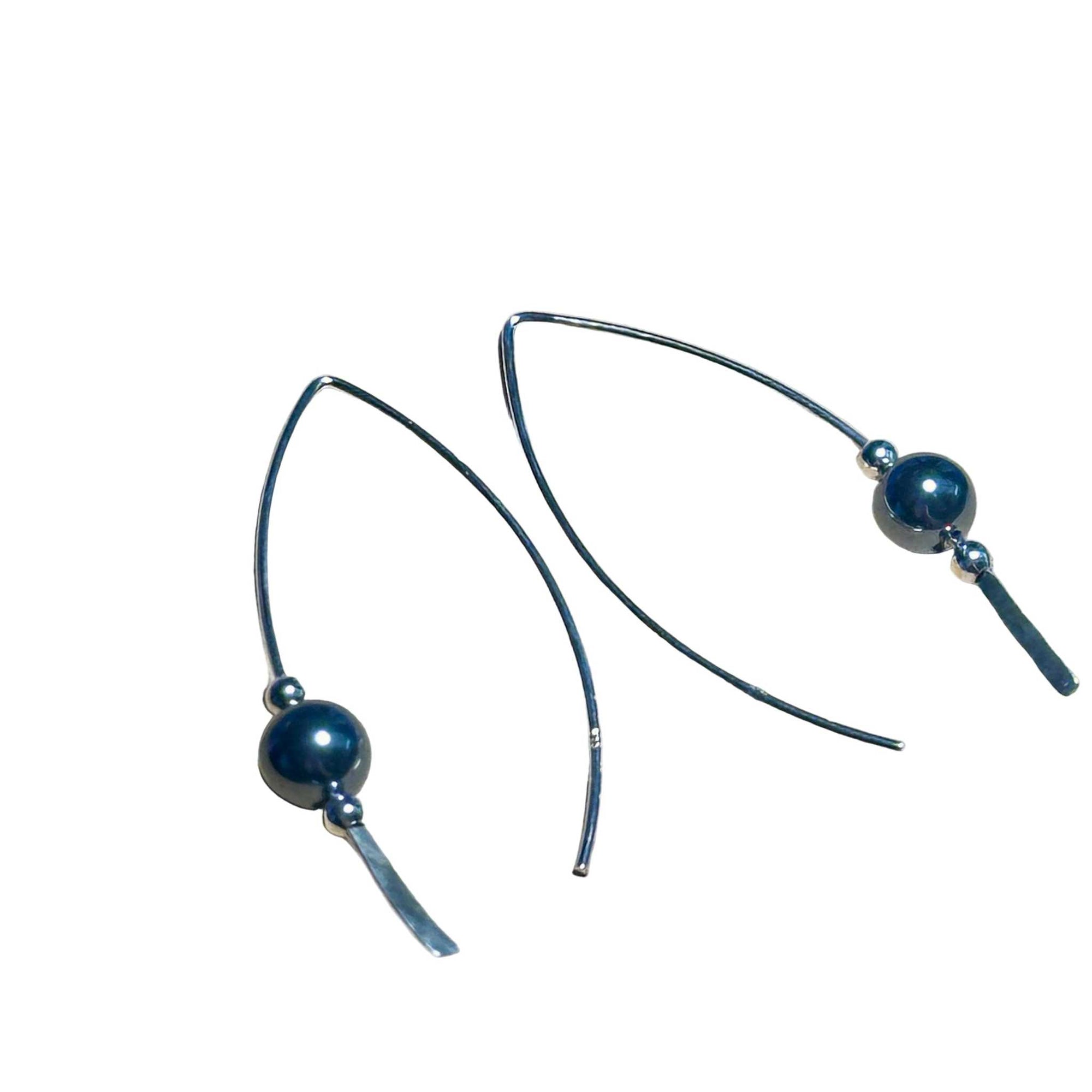Pair of Hematite beaded earrings on a background