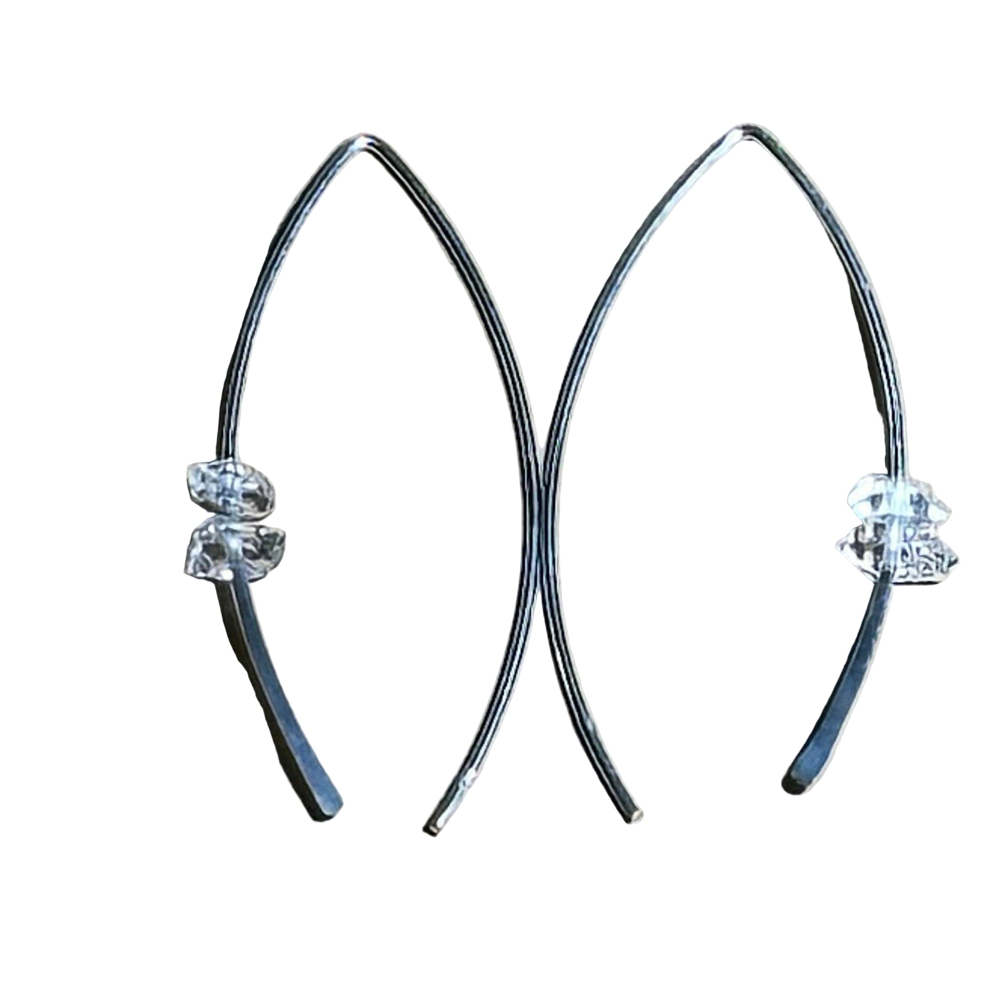 Herkimer Royal Crescent Bertoni sterling silver delicate curved earrings with clear backings on neutral background