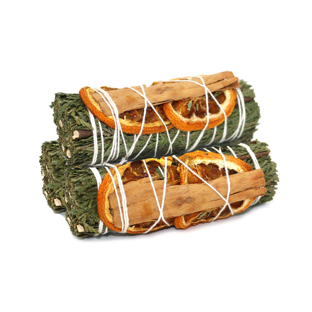 4-inch Cedar, Orange, and Cinnamon Smudge Stick Bundle with stacked dried orange slices and cinnamon sticks tied with white string for cleansing and aromatic rituals