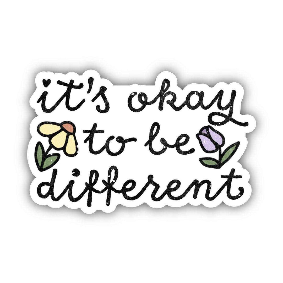 "It's Okay To Be Different" vinyl sticker with handwritten text and colorful flower illustrations, waterproof and durable for indoor and outdoor use.