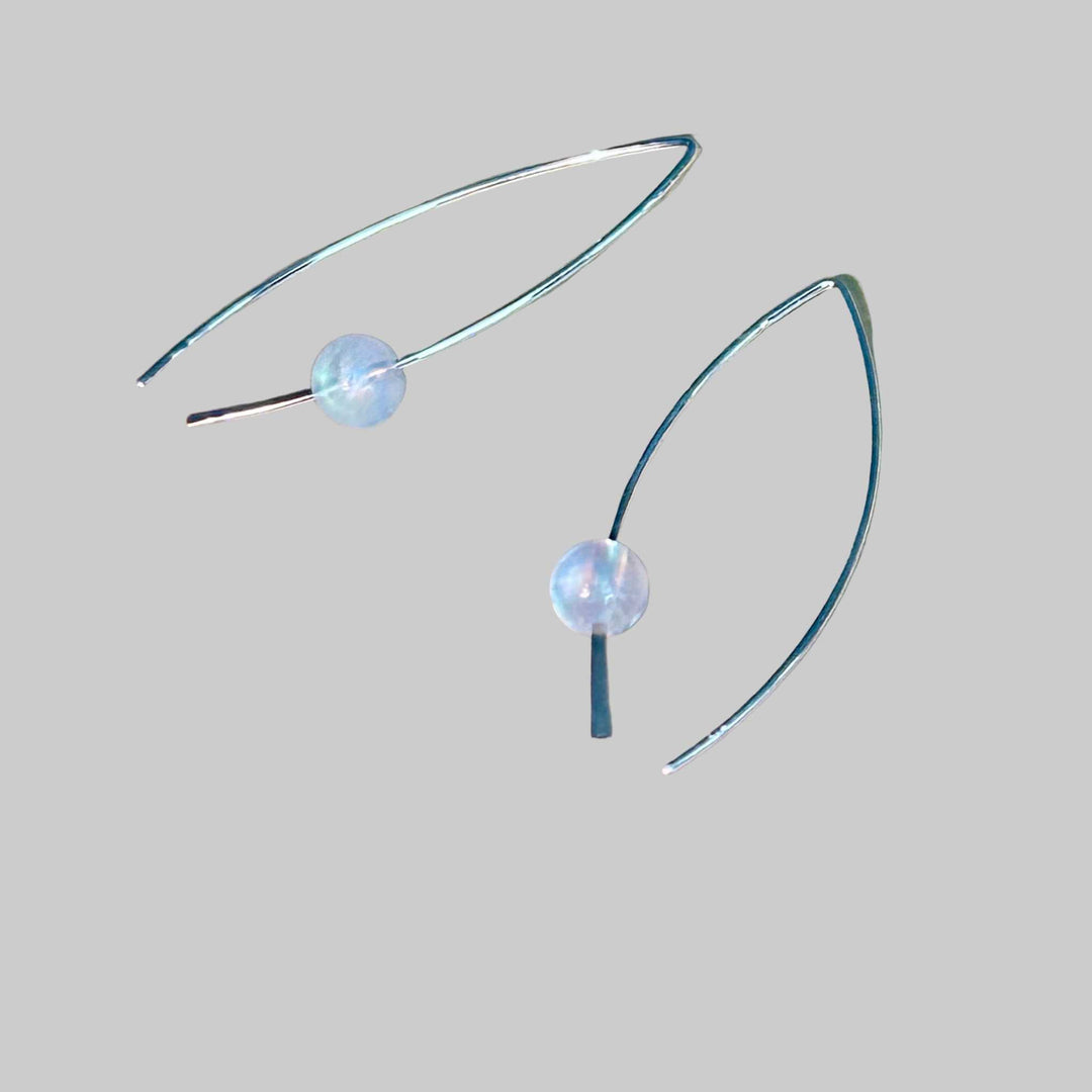 Sterling Silver earrings with round rainbow moonstone stone bead on a background, the rainbow moonstone is flashy!