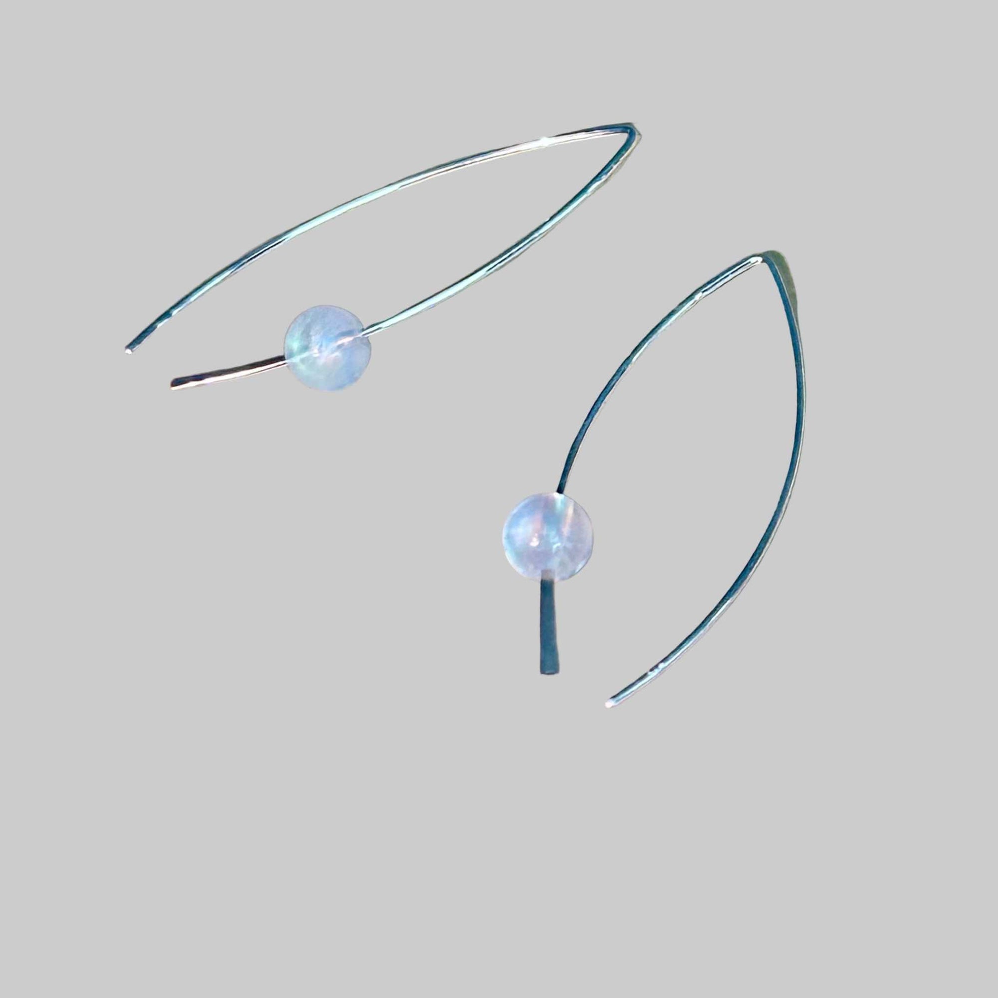 Sterling Silver earrings with round rainbow moonstone stone bead on a background, the rainbow moonstone is flashy!