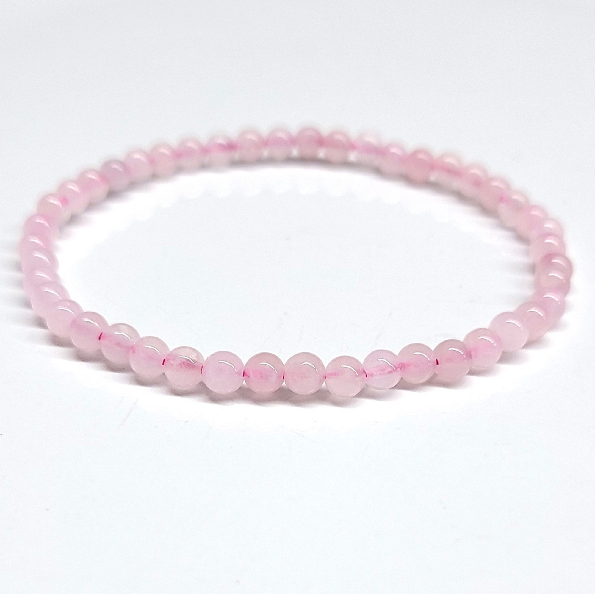 Rose Quartz Bracelet with 4mm beads, symbolizing love and emotional healing.