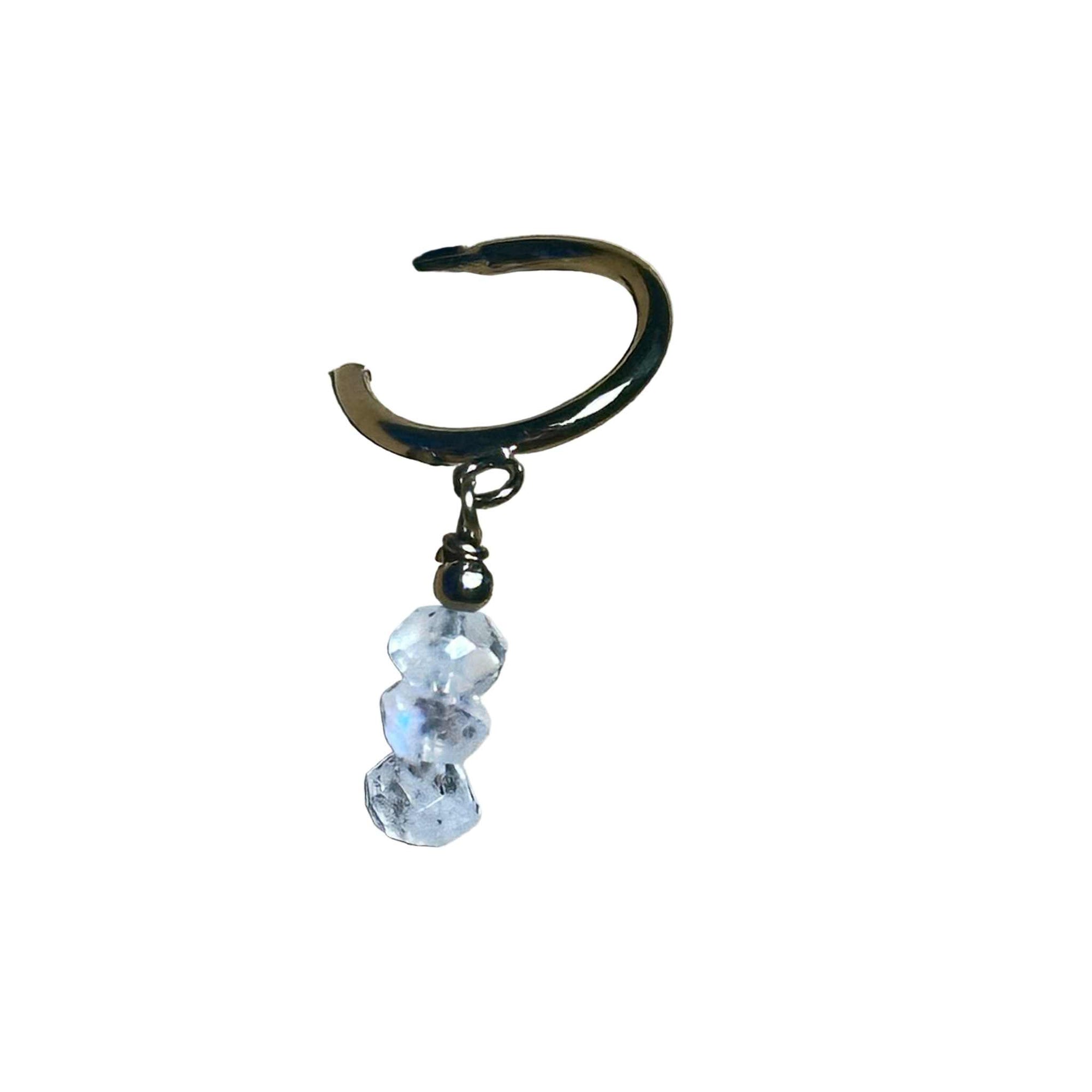 Gold hoop earring with Rainbow Moonstone gemstone faceted beads on a background