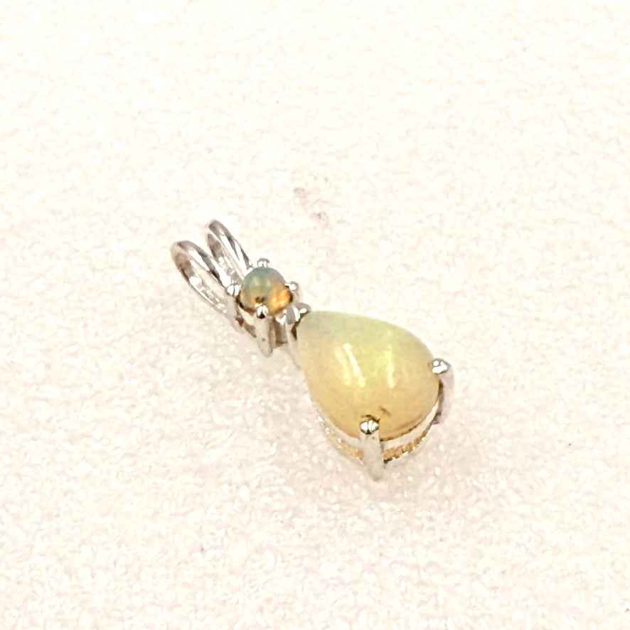 Sterling Silver Opal Pear Pendant with Accent Stone