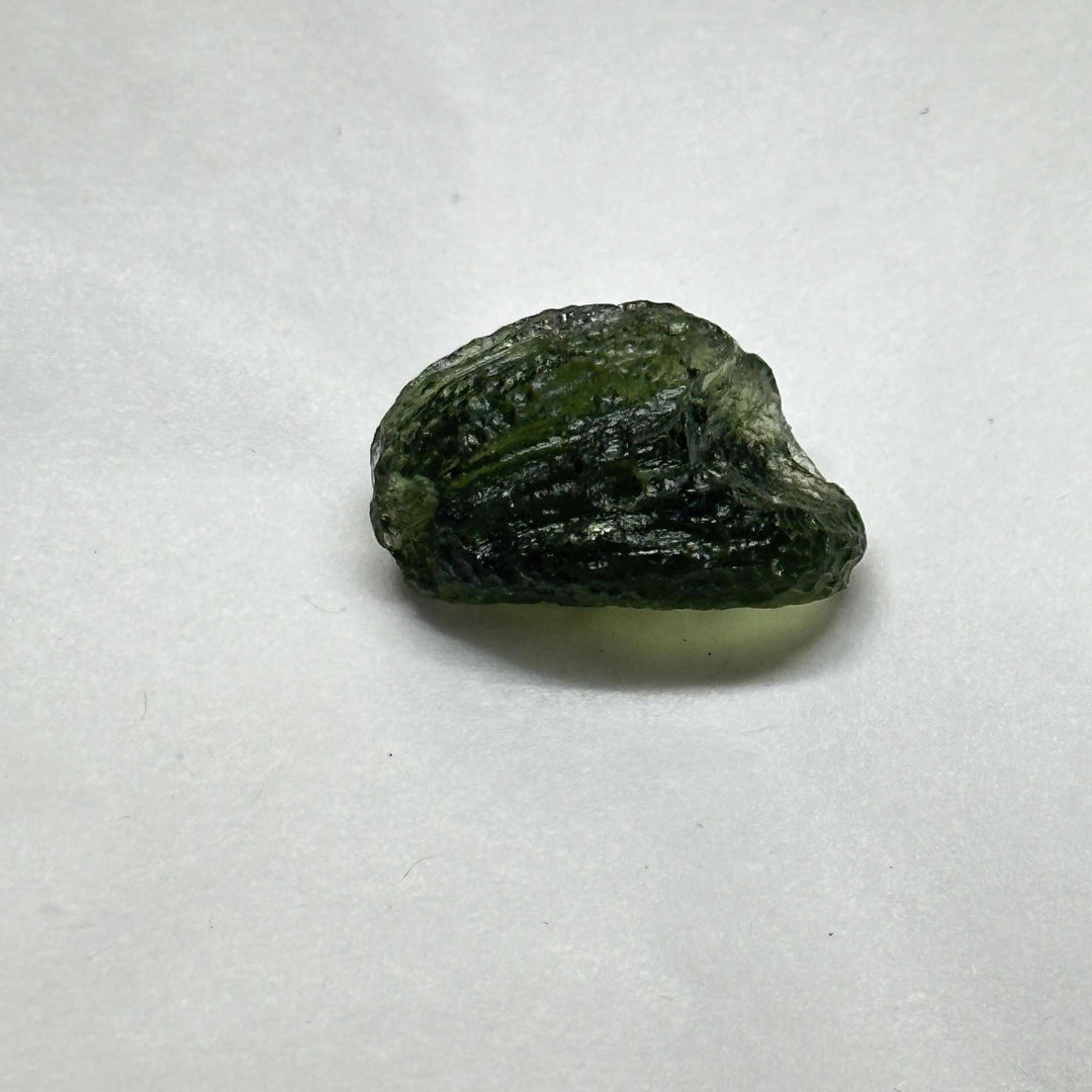 Moldavite 3.948 grams rare green tektite stone for spiritual and cosmic development.