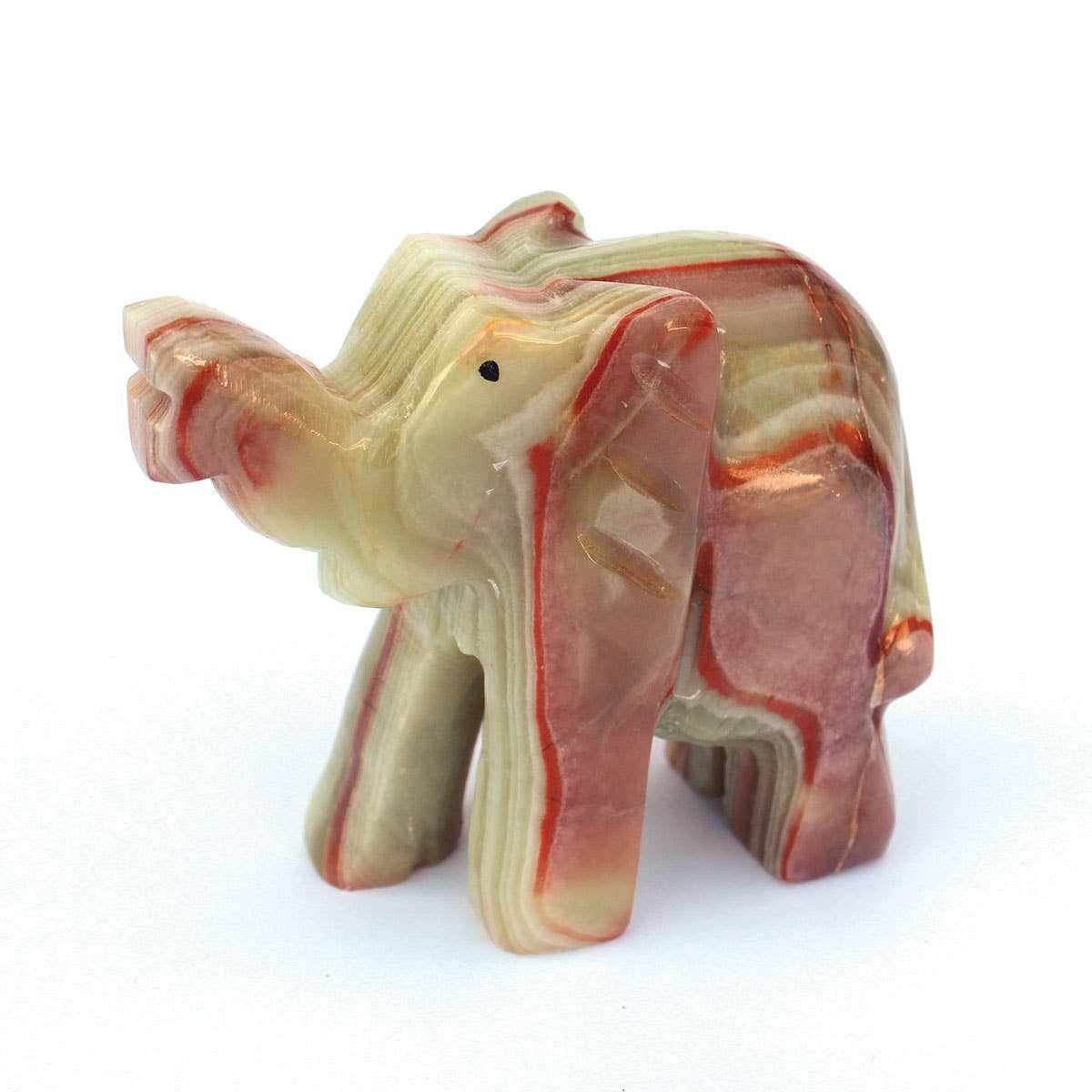 Hand-carved 3-inch onyx elephant figurine with natural stone patterns for home decor and spiritual spaces