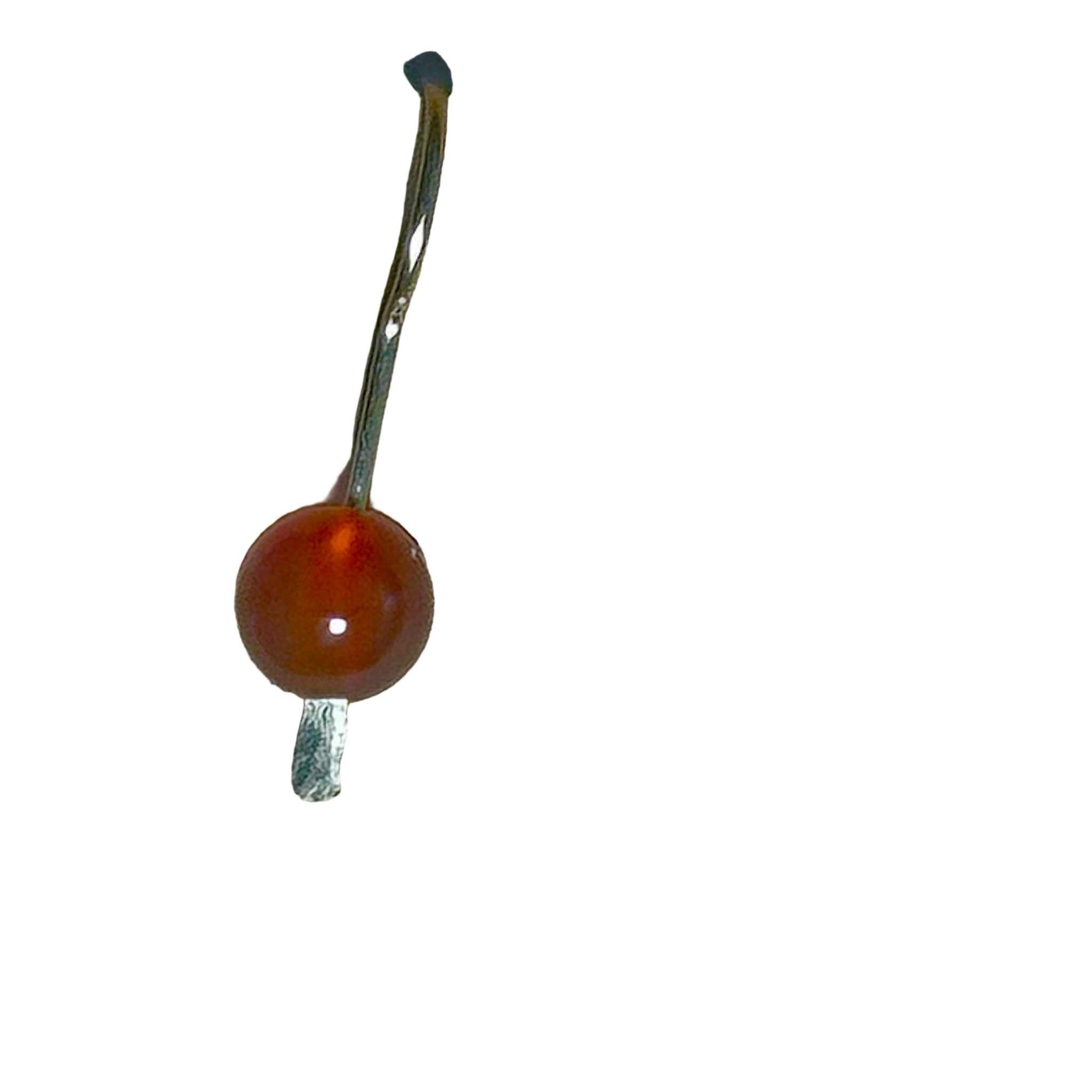 Earring with red Carnelian stones on a background