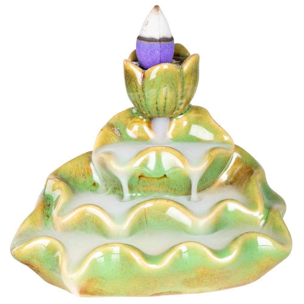 Green lotus backflow incense burner with cascading smoke and lotus design
