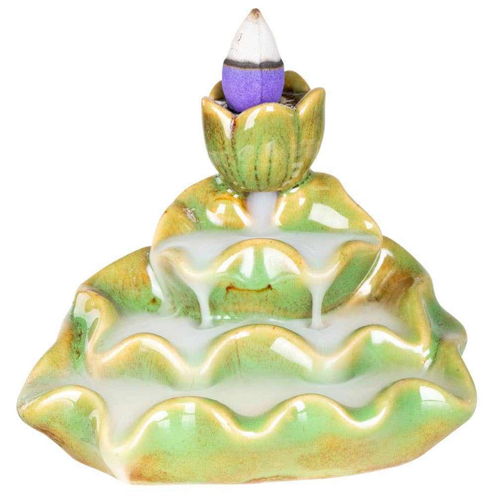 Green lotus backflow incense burner with cascading smoke and lotus design