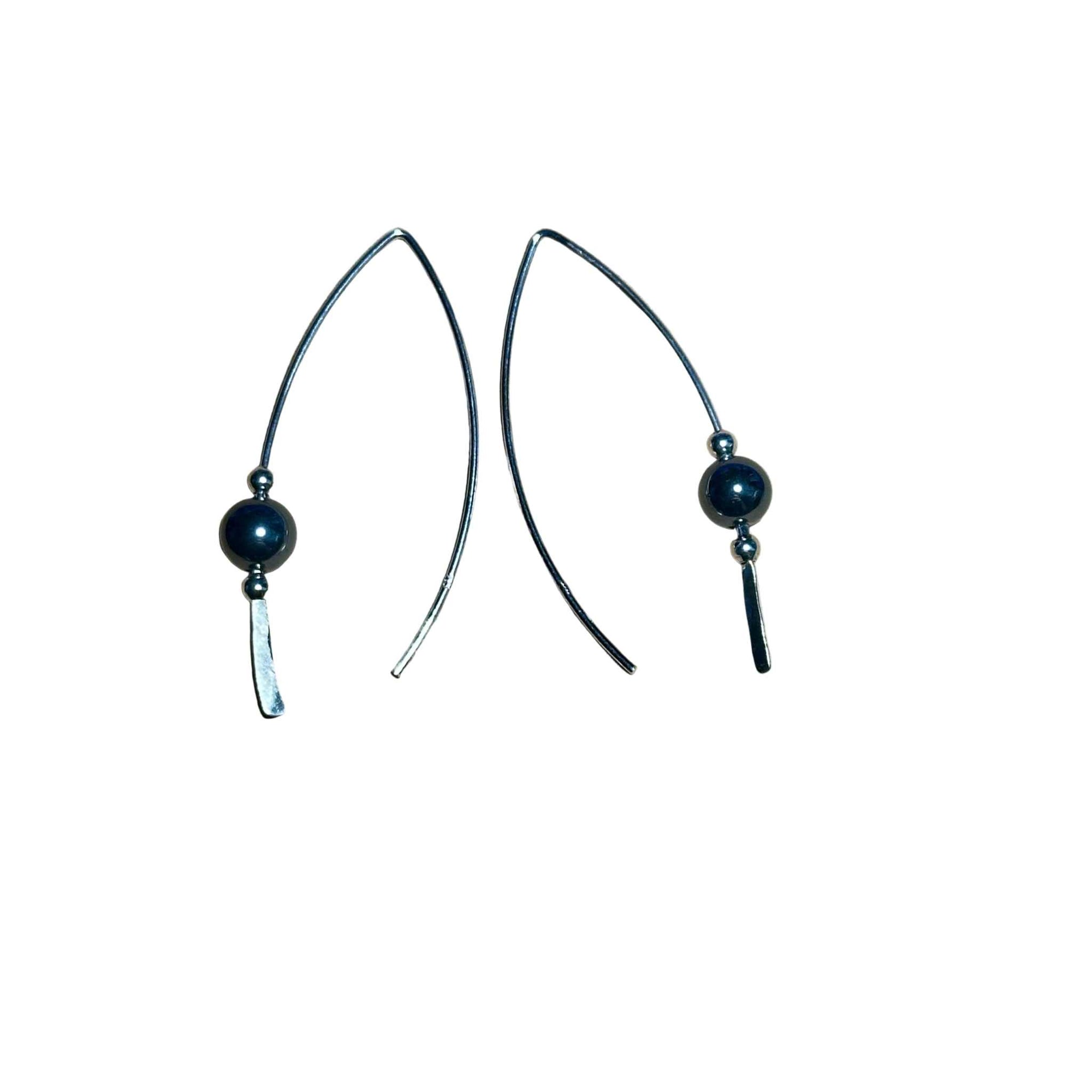 Pair of Hematite beaded earrings on a background