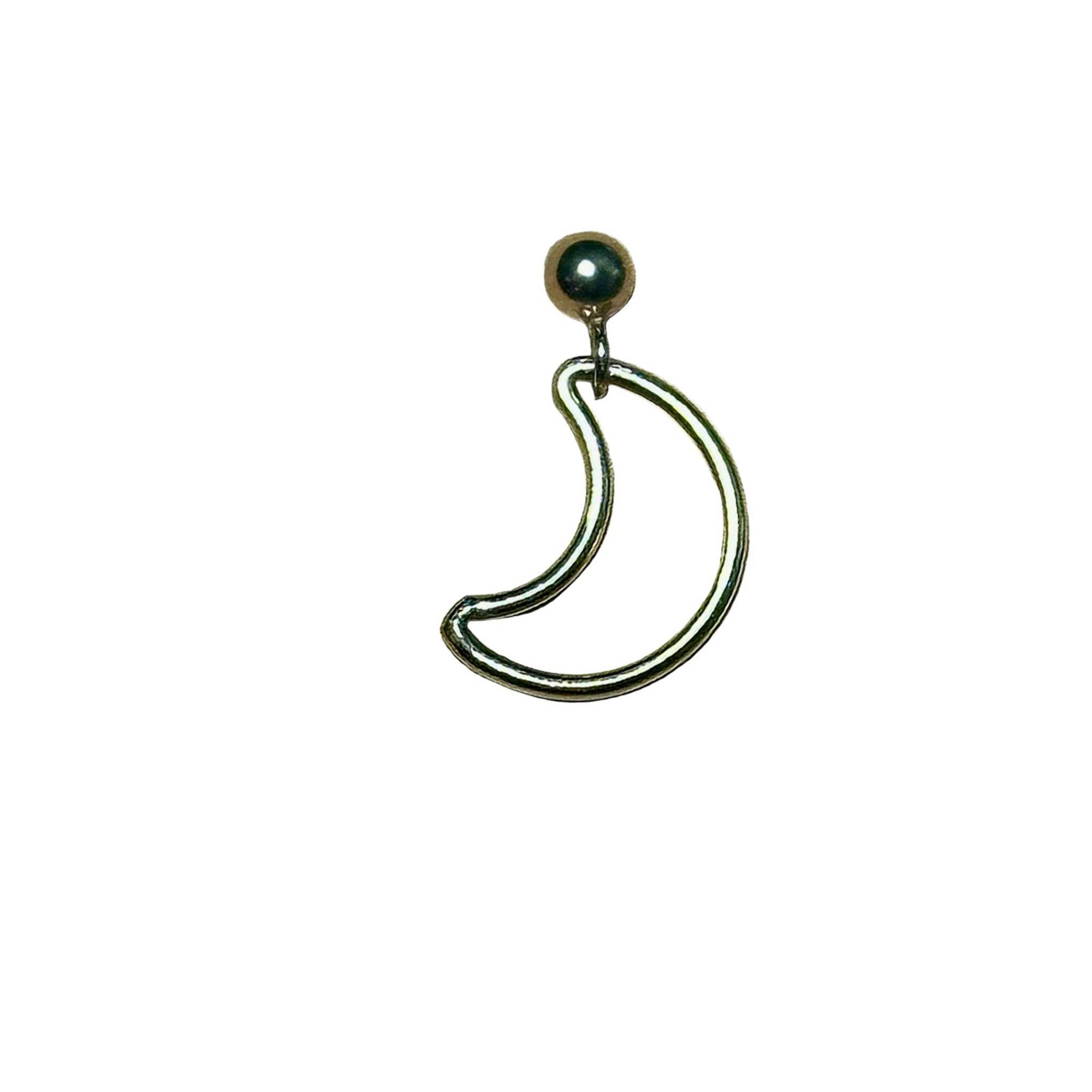 Gold crescent moon-shaped earring on a background