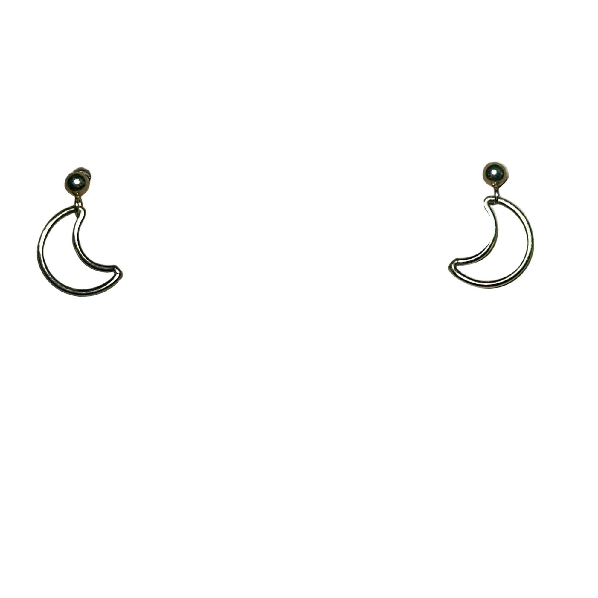 Pair of gold crescent moon-shaped earrings on a background