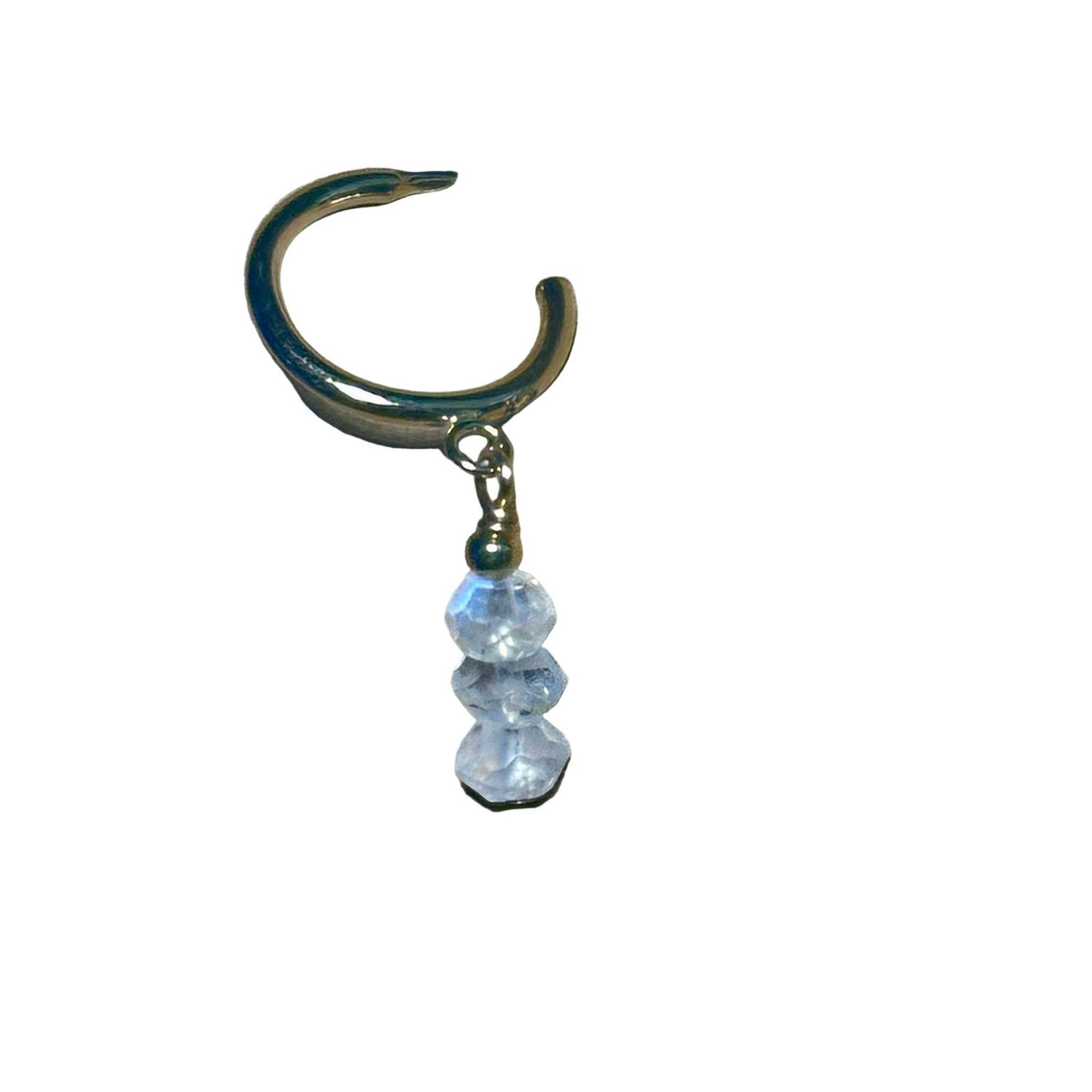 Gold hoop earring with Rainbow Moonstone gemstone faceted beads on a background