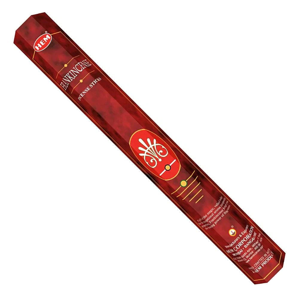 Red box of HEM incense sticks on a white background