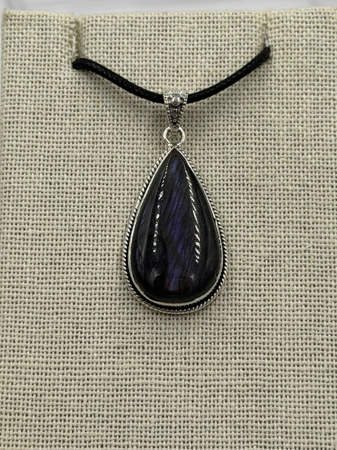 Sterling Silver Bezeled Teardrop Spectrolite Pendant