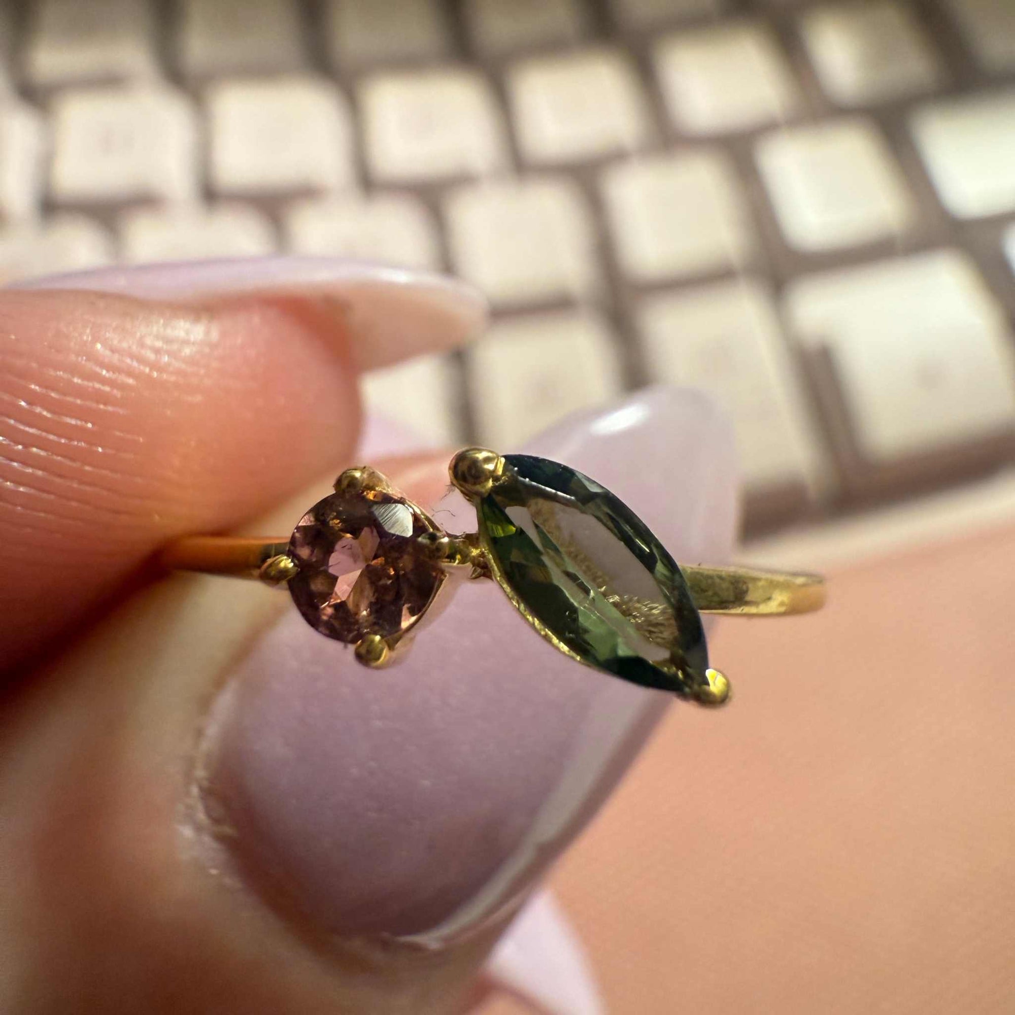 Gold ring with 2 stones