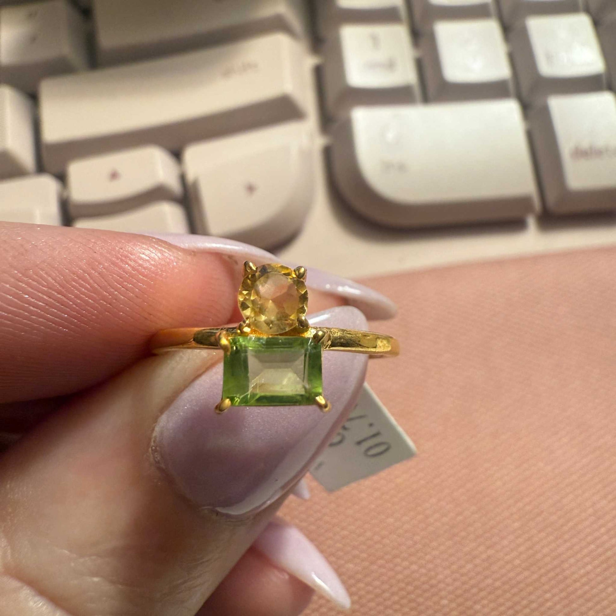 Gold ring with 2 stones