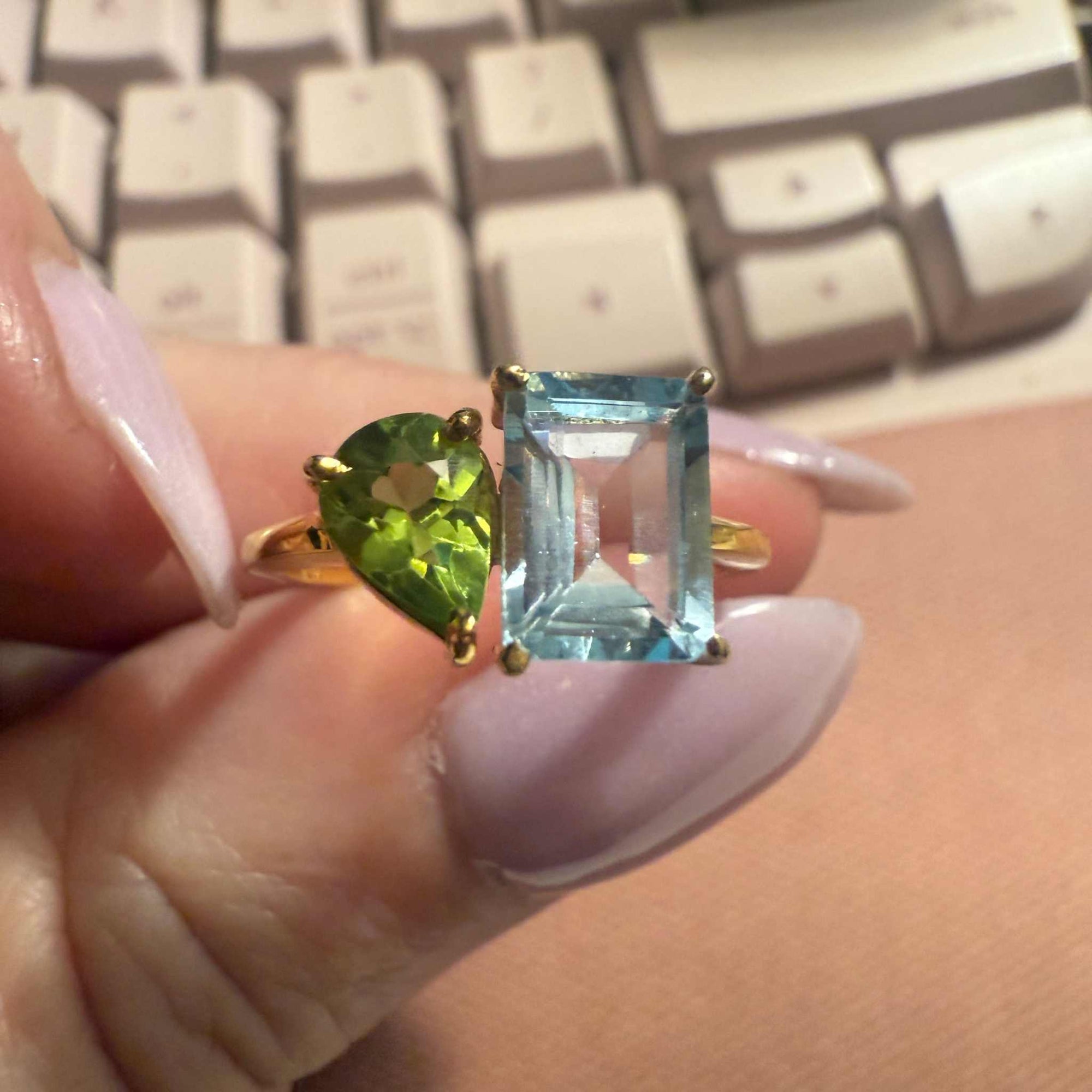 Gold ring with 2 stones