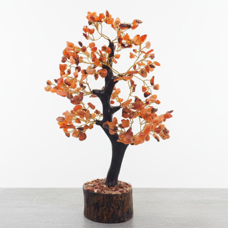 Small tree with orange Carnelian gemstone leaves on a white background