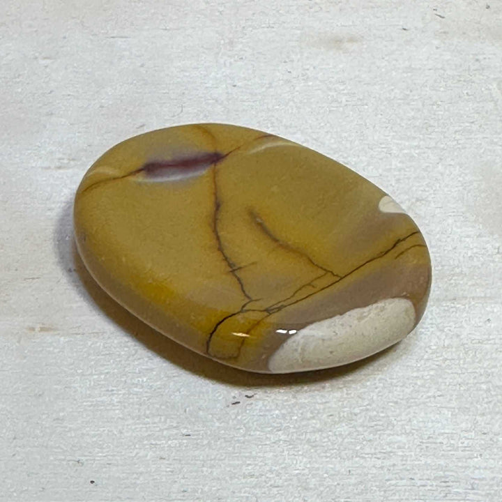 Marbled stone on a textured white surface