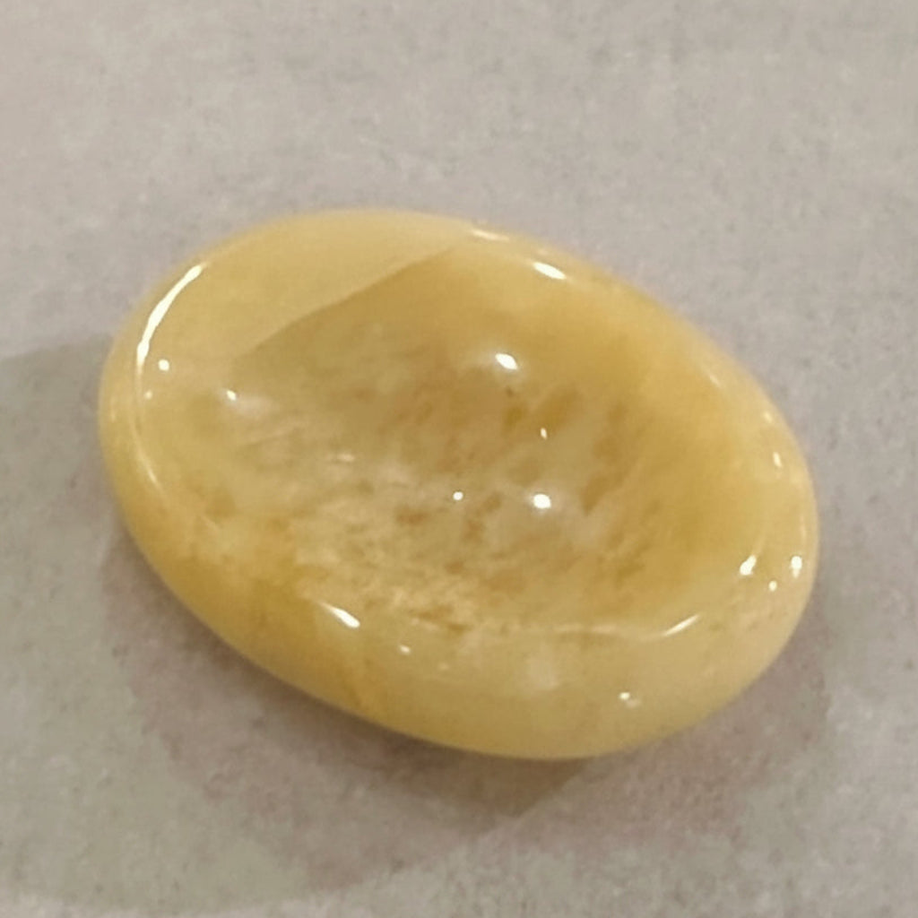 Golden Aventurine Comfort Stone with shimmering golden hues, symbolizing confidence and positivity.