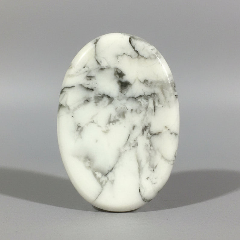 Marble-patterned stone on a gray background