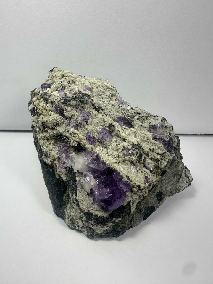 Purple Fluorite Clusters on Matrix