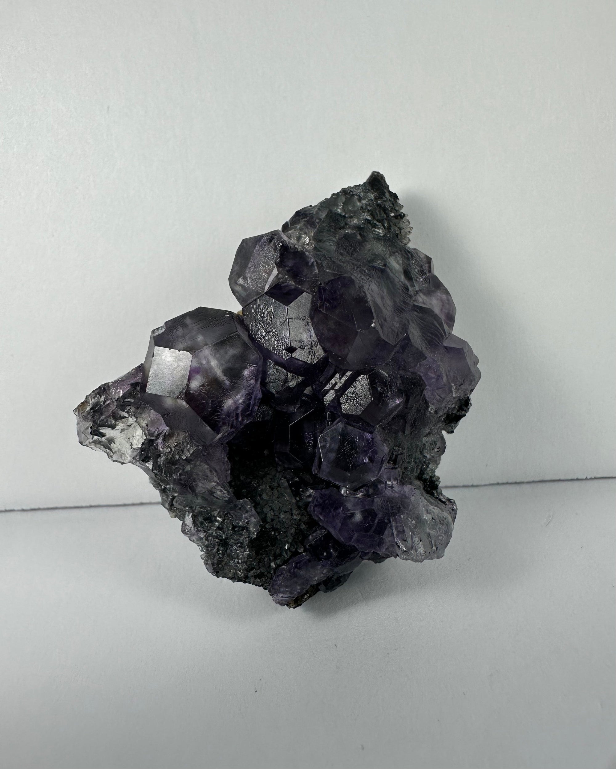 Purple Dodecahedral Fluorite with Calcite on matrix