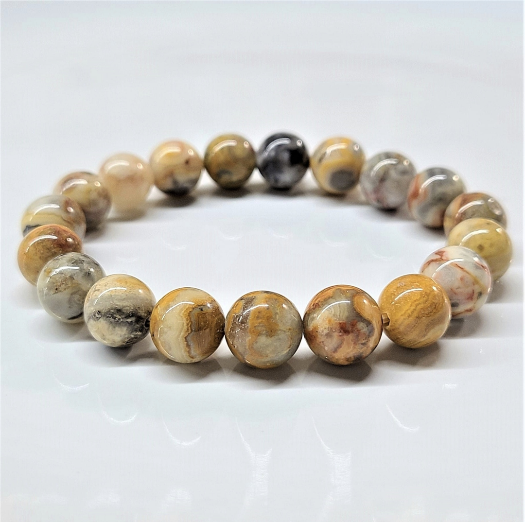 Crazy Lace Agate round bead stackable bracelet with natural multicolor swirling patterns.