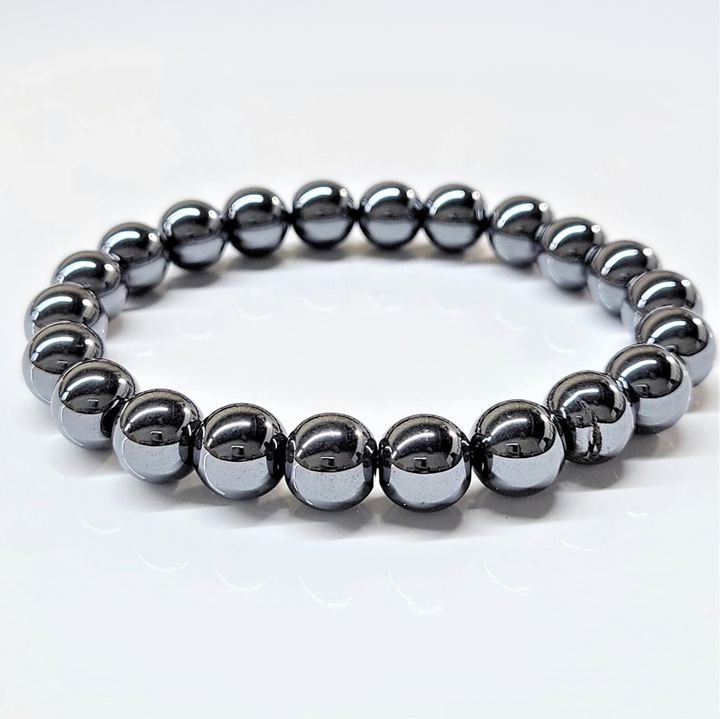 Hematite round bead stackable bracelet with metallic sheen and grounding properties.